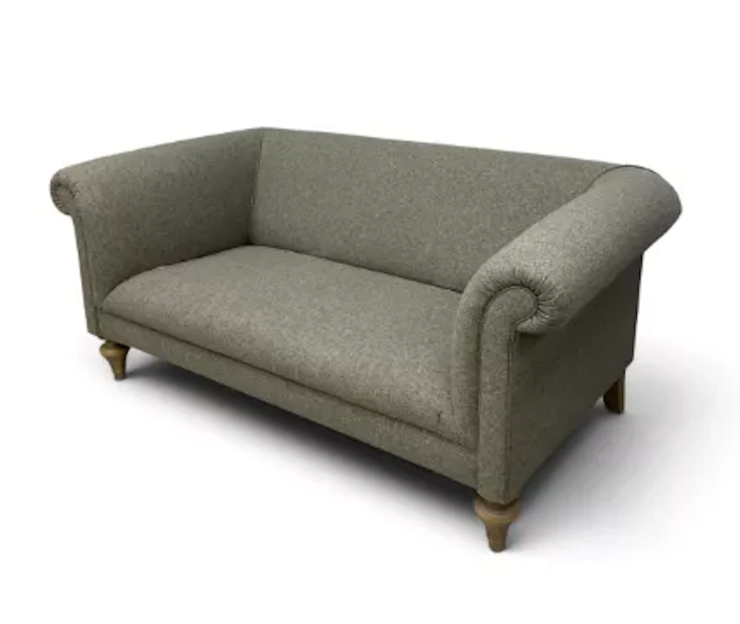 A contemporary Chesterfield style upholstered two seater sofa, rolled