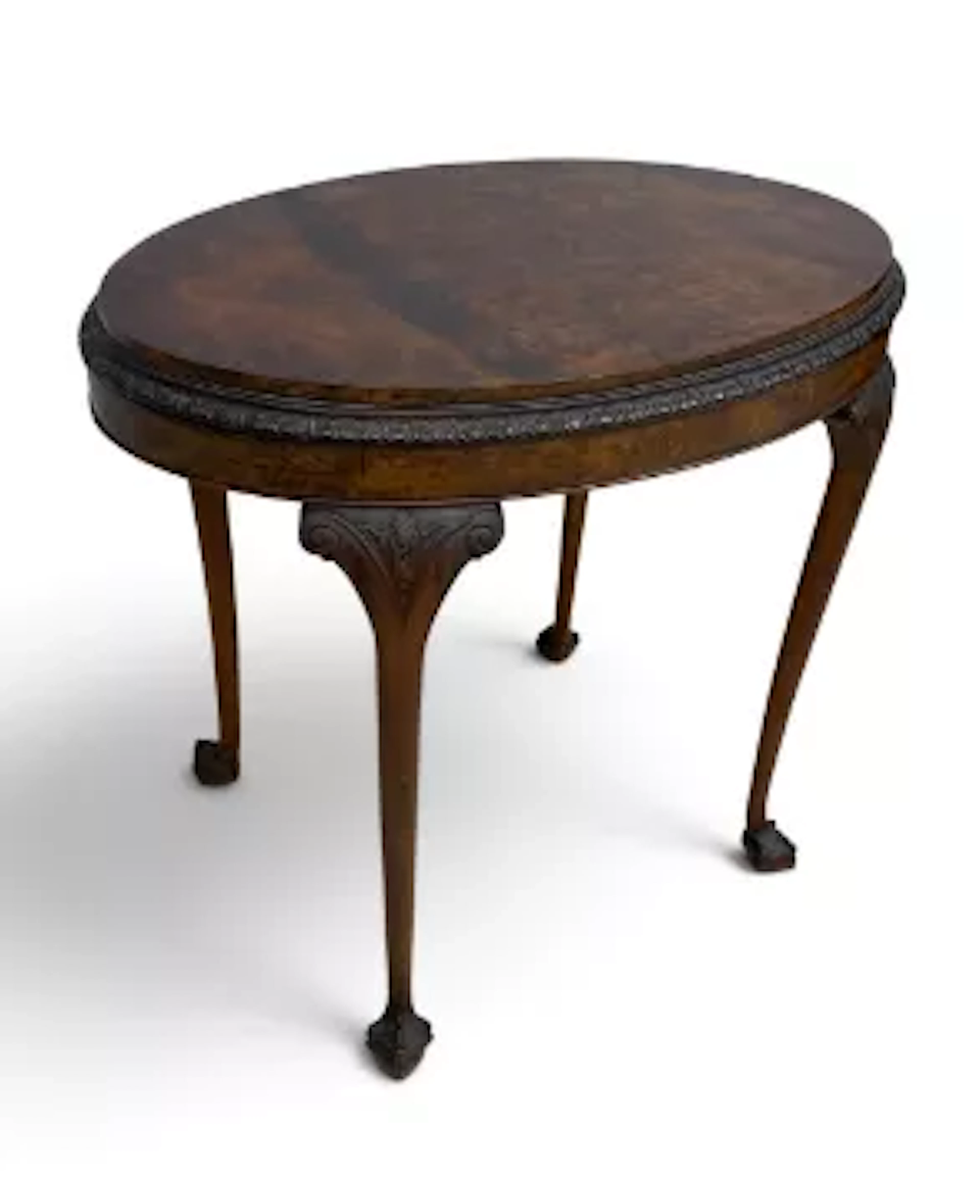 A mid 20th century oval occasional table, burr walnut with carved