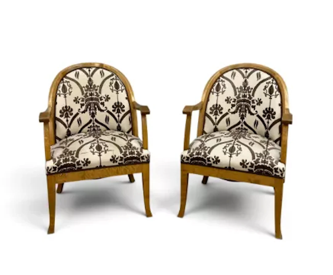 A pair of contemporary Scandinavian style satin birch armchairs with