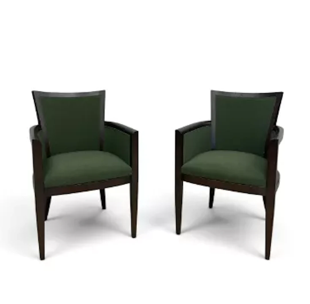 A pair of contemporary stained teak salon armchairs in calico upholstery.