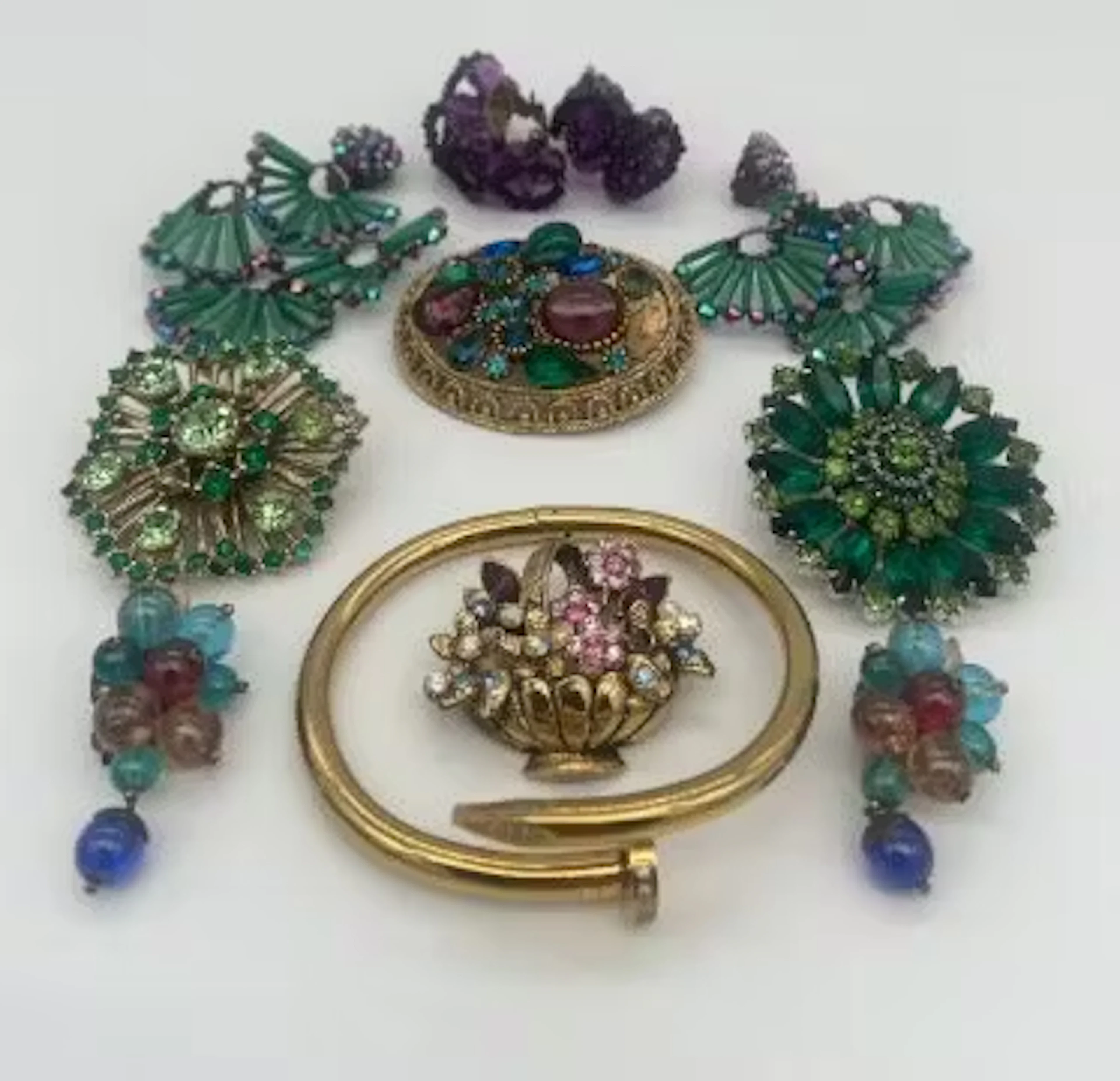 Mixed costume jewellery to include a serpent bangle marked Cartier