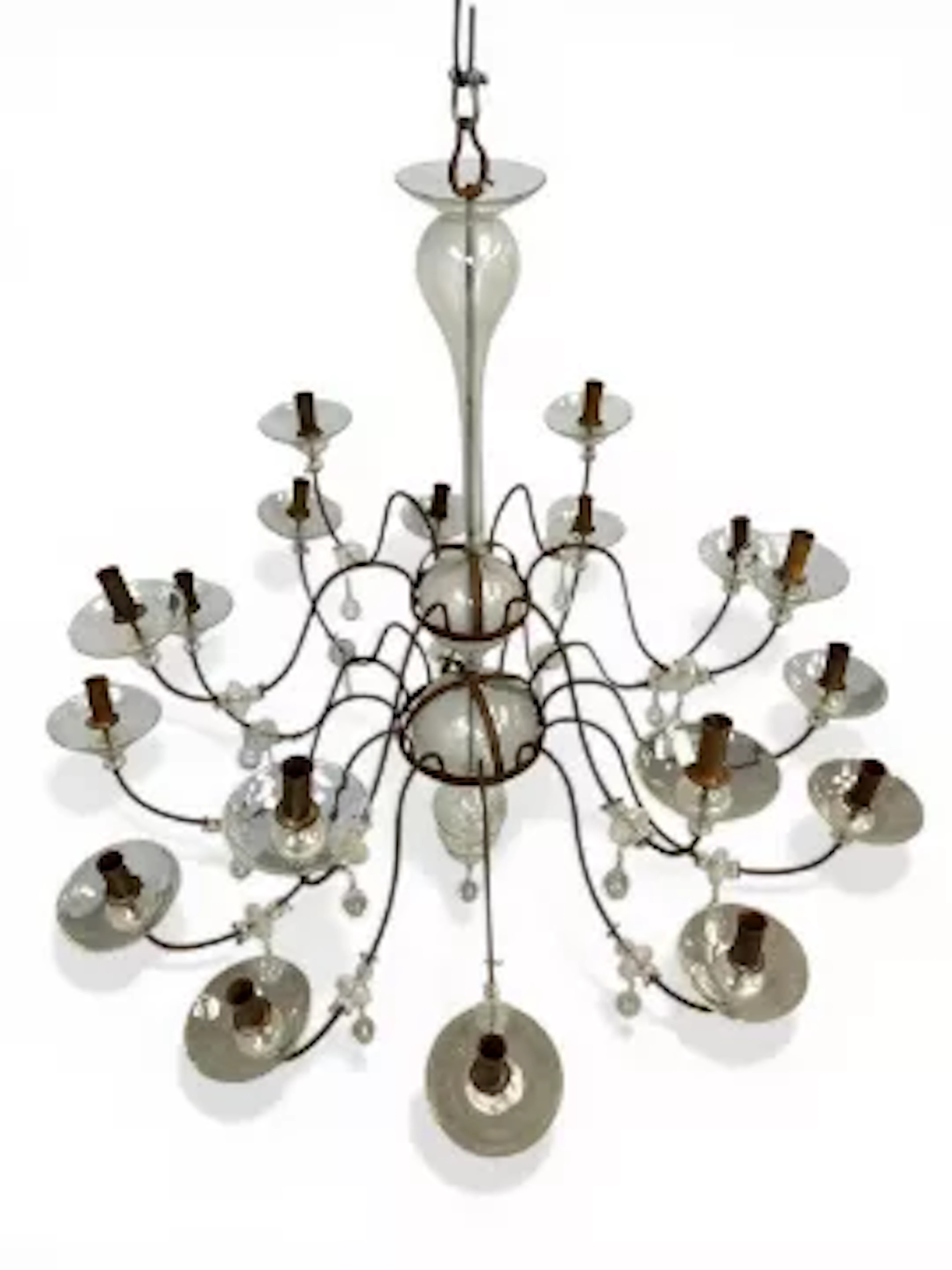 A large late 19th century eighteen branch wrought iron chandelier