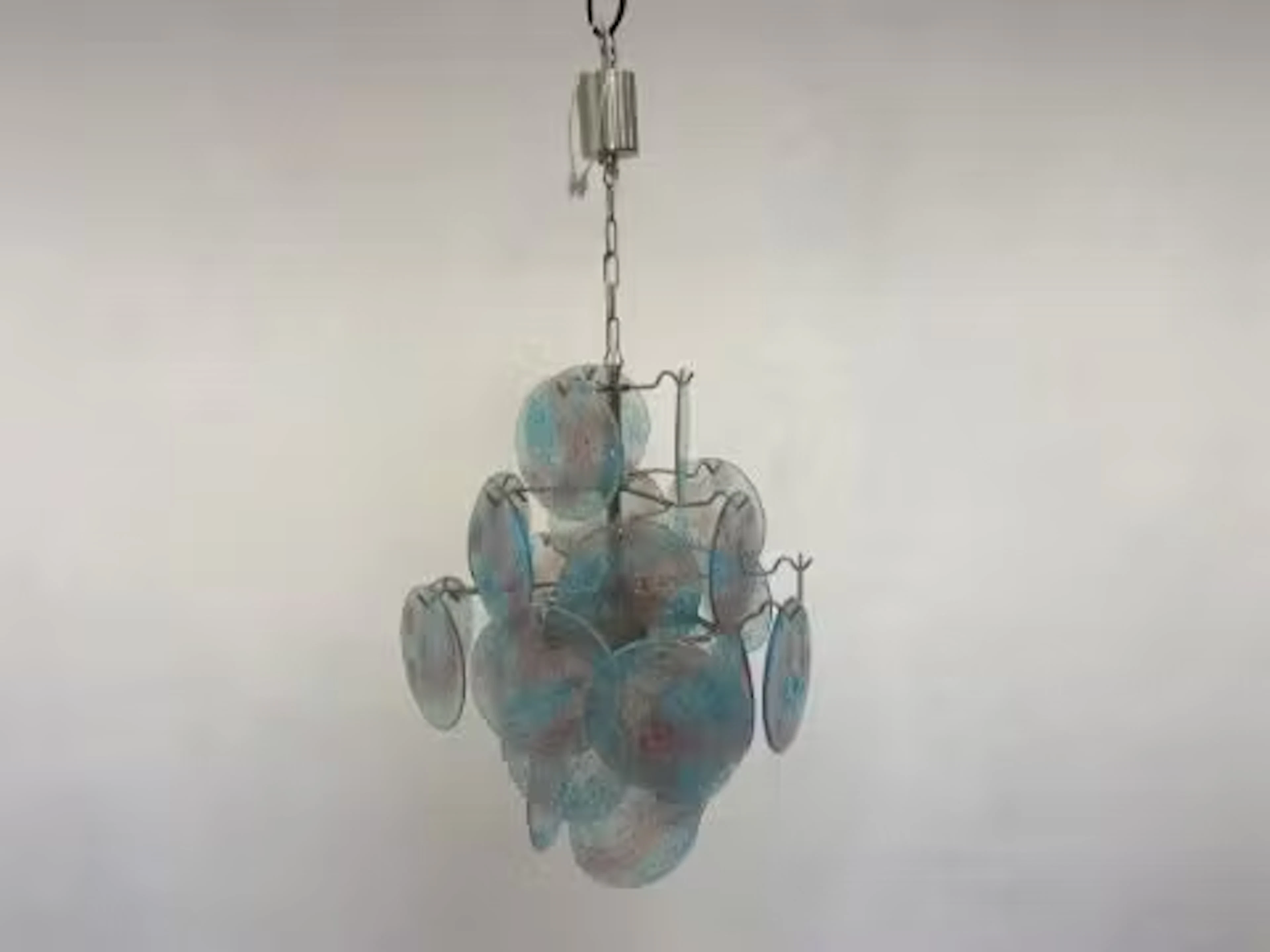 A vintage Murano Venetian iridescent grit glass disc chandelier with