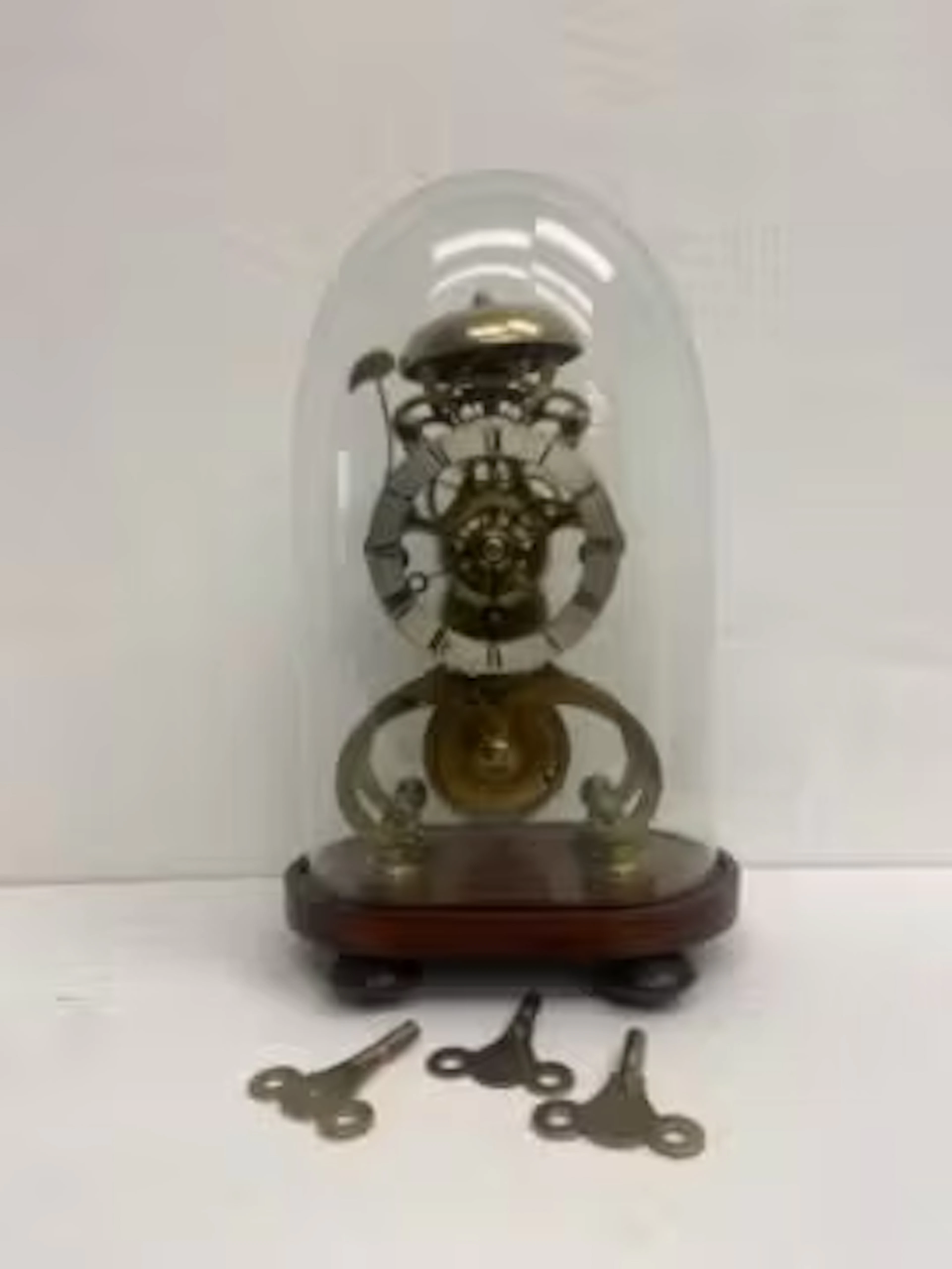 A 19th century brass skeleton clock, the steel dial marked B Jacobs