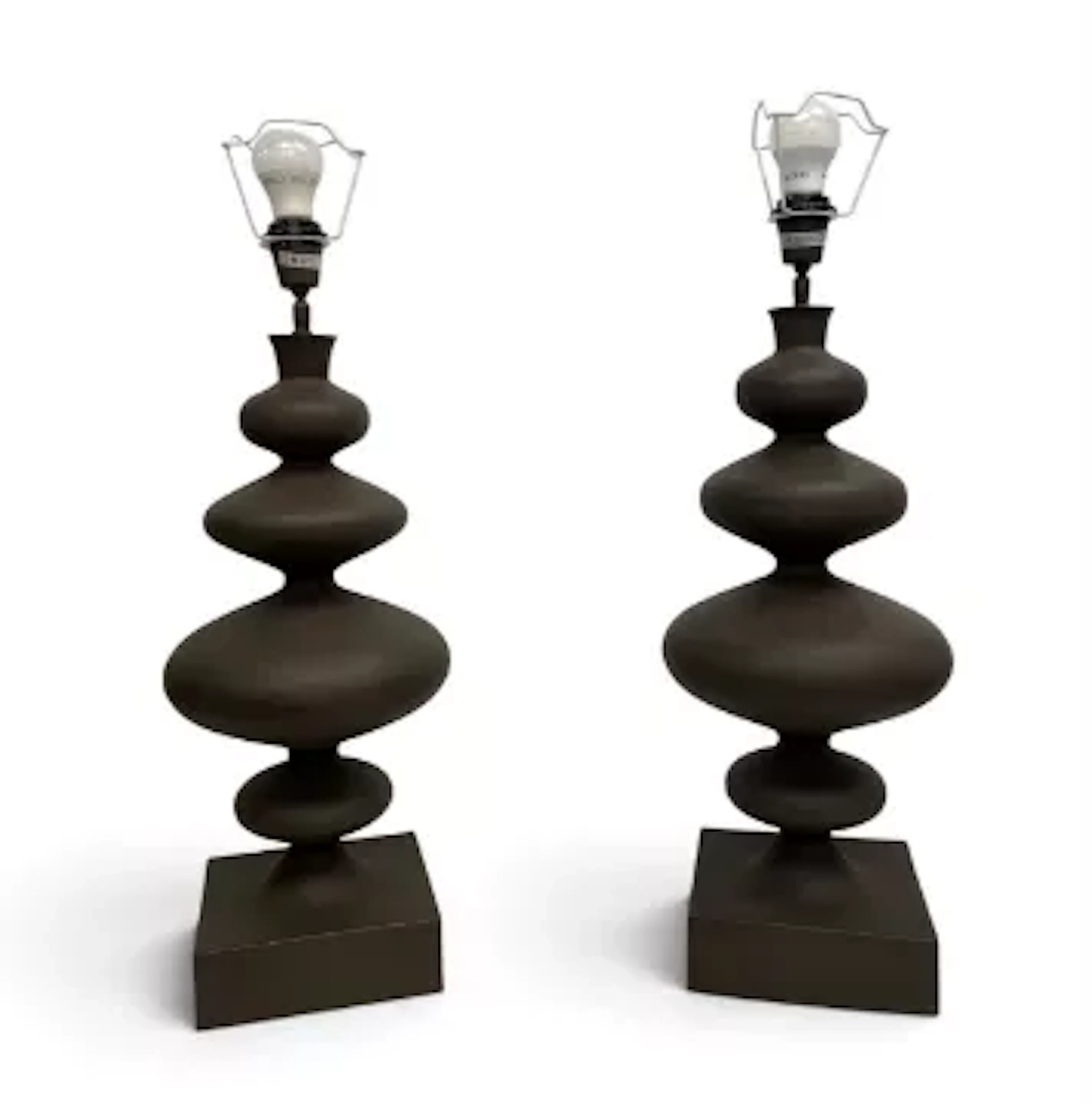 A pair of contemporary Parex table lamps, sculptured form with a heavy