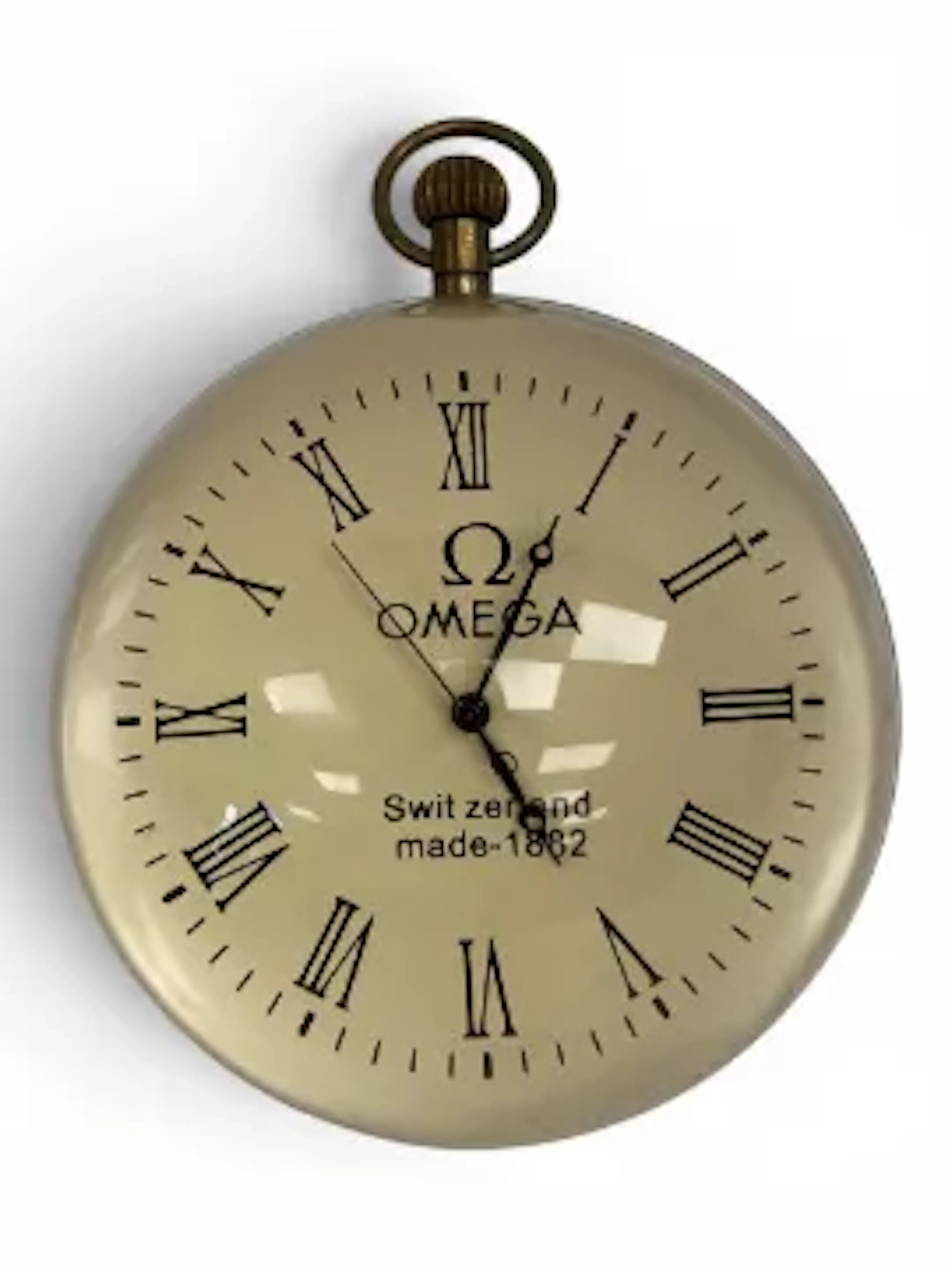 A vintage Omega style brass bound crystal ball desk clock having a