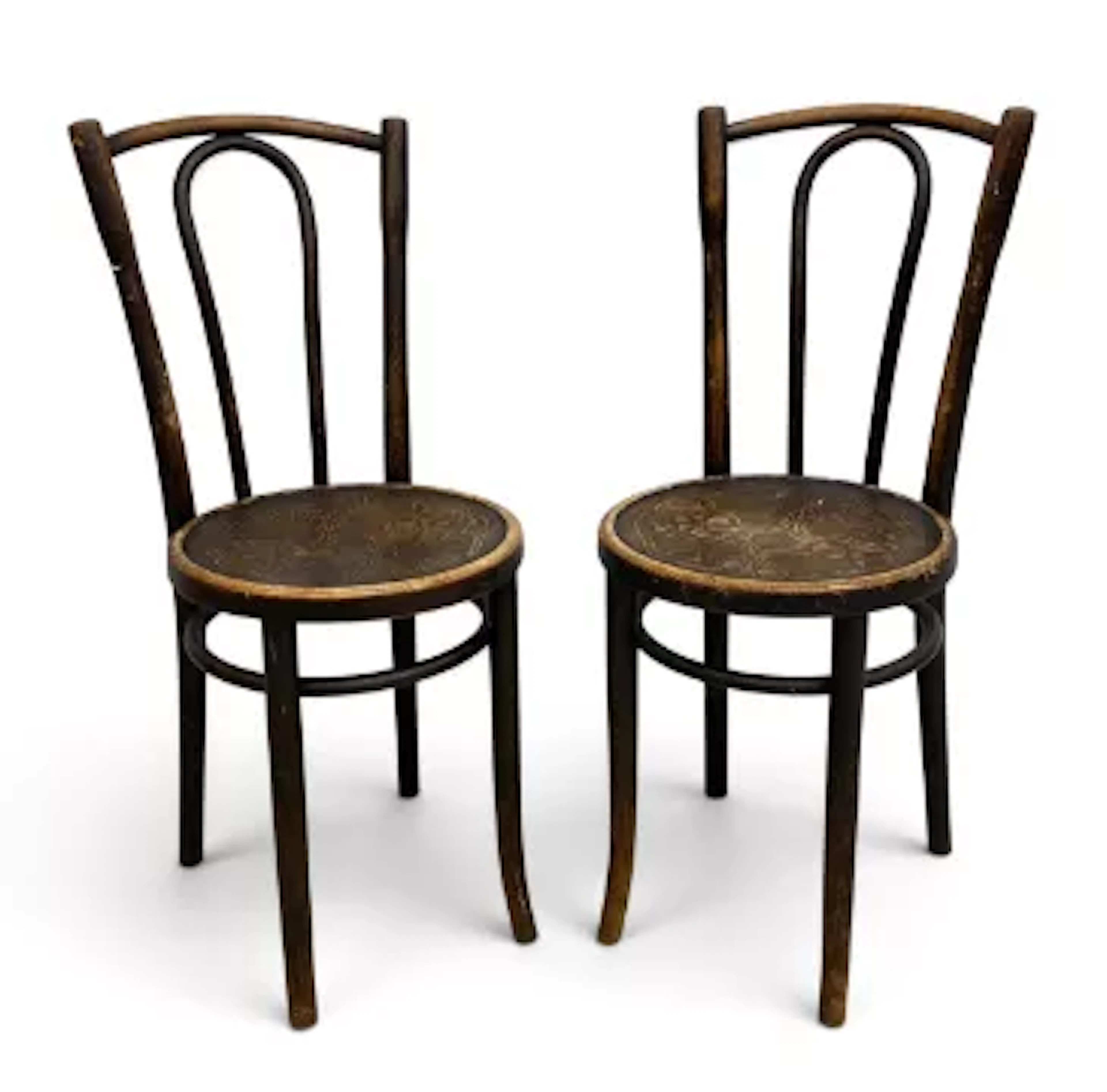 A pair of Thonet style bentwood cafe chairs each with a shaped back