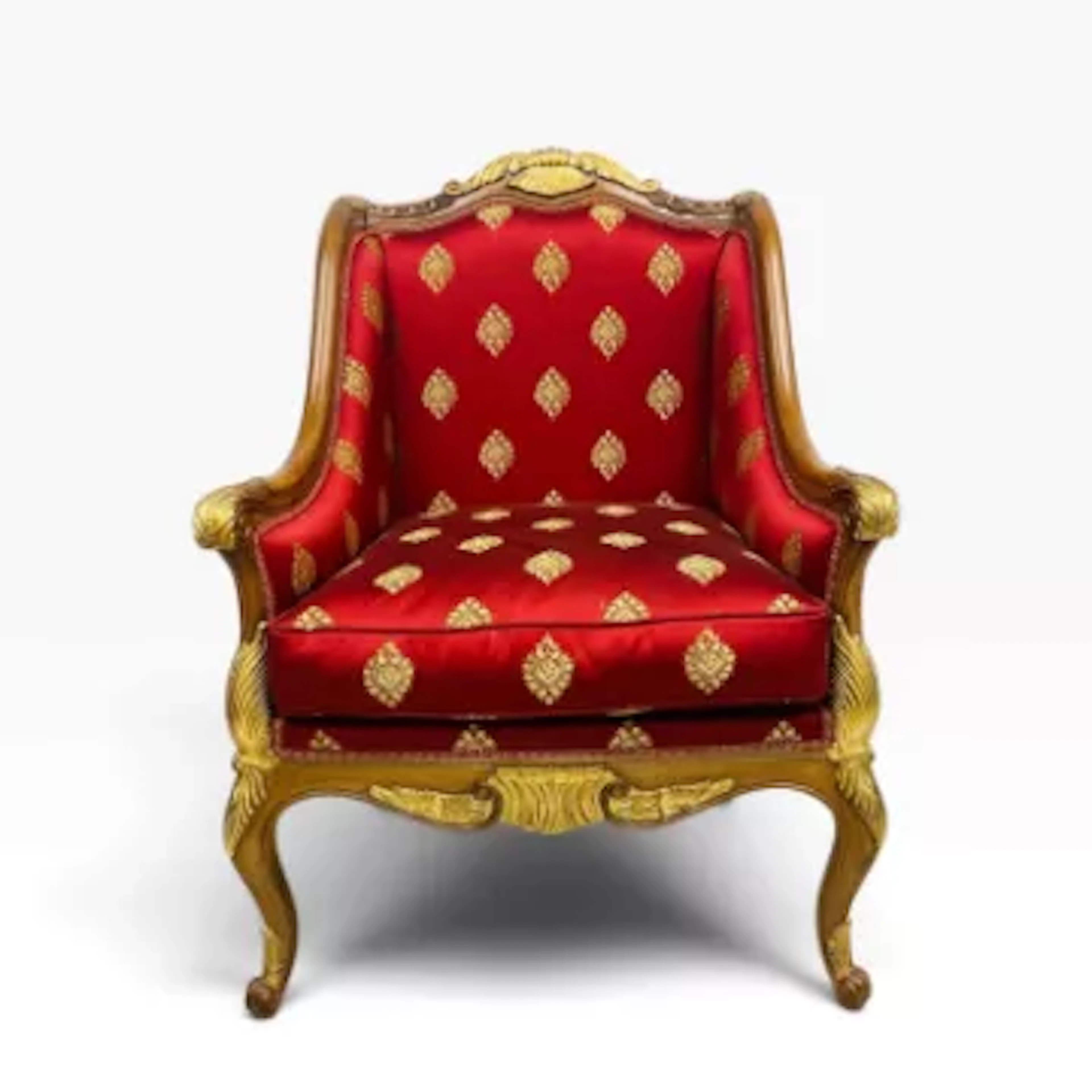 A contemporary Louis XV style armchair having a gilt crested back