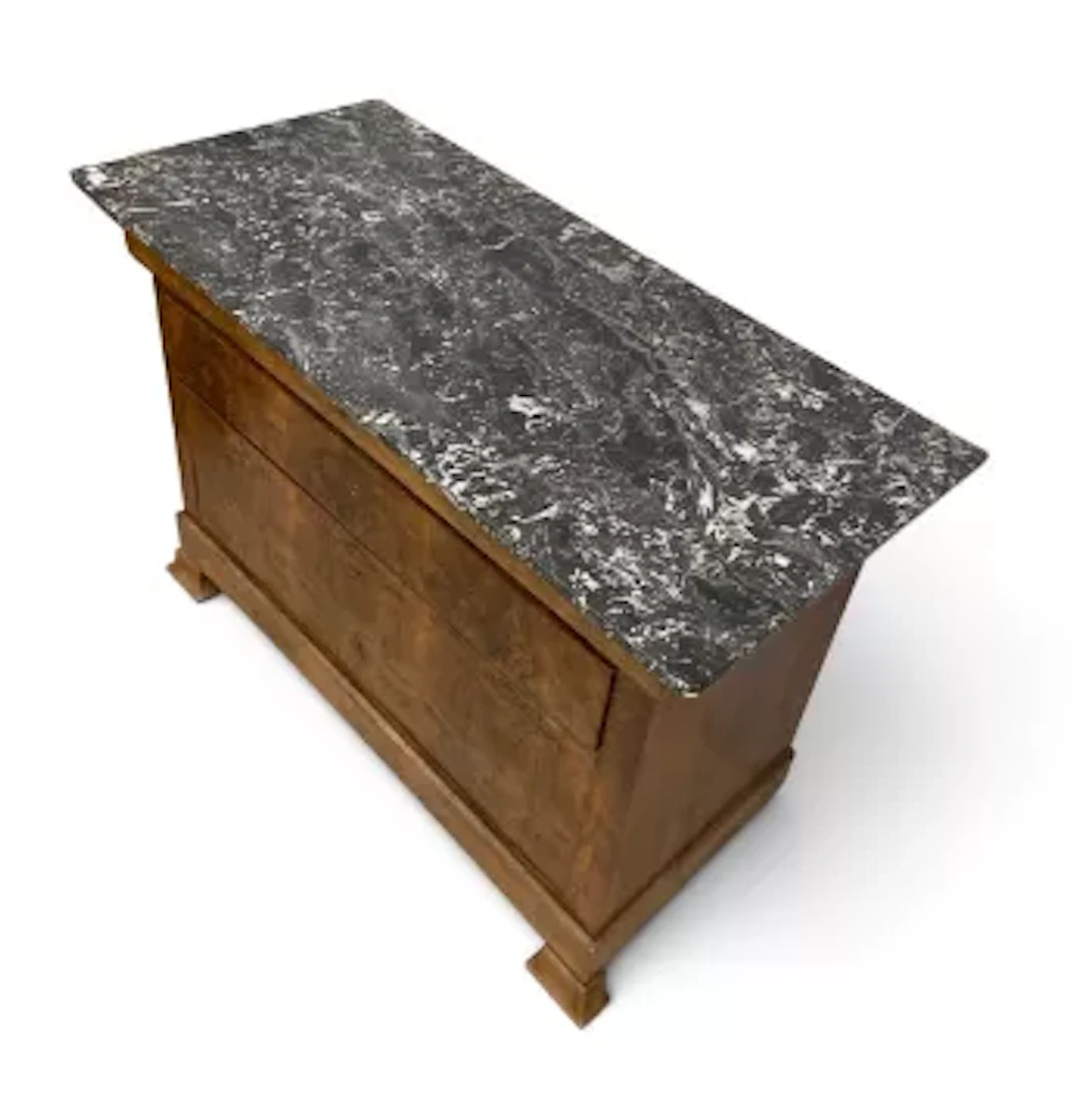 A 19th century Louis Philippe burr walnut commode with grey veined