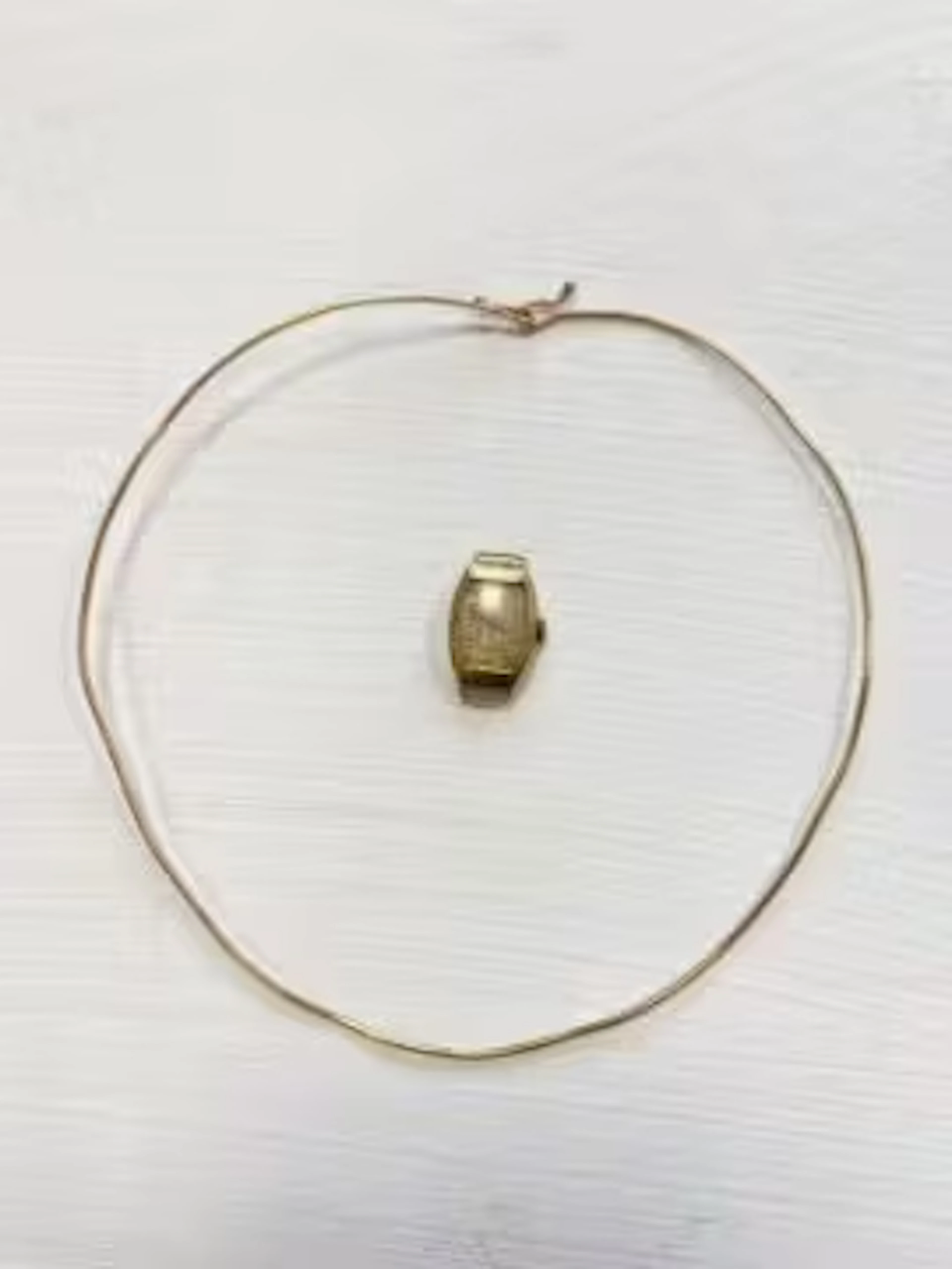 A 14ct gold choker (tests as 14k) and a watch case marked 14k (without