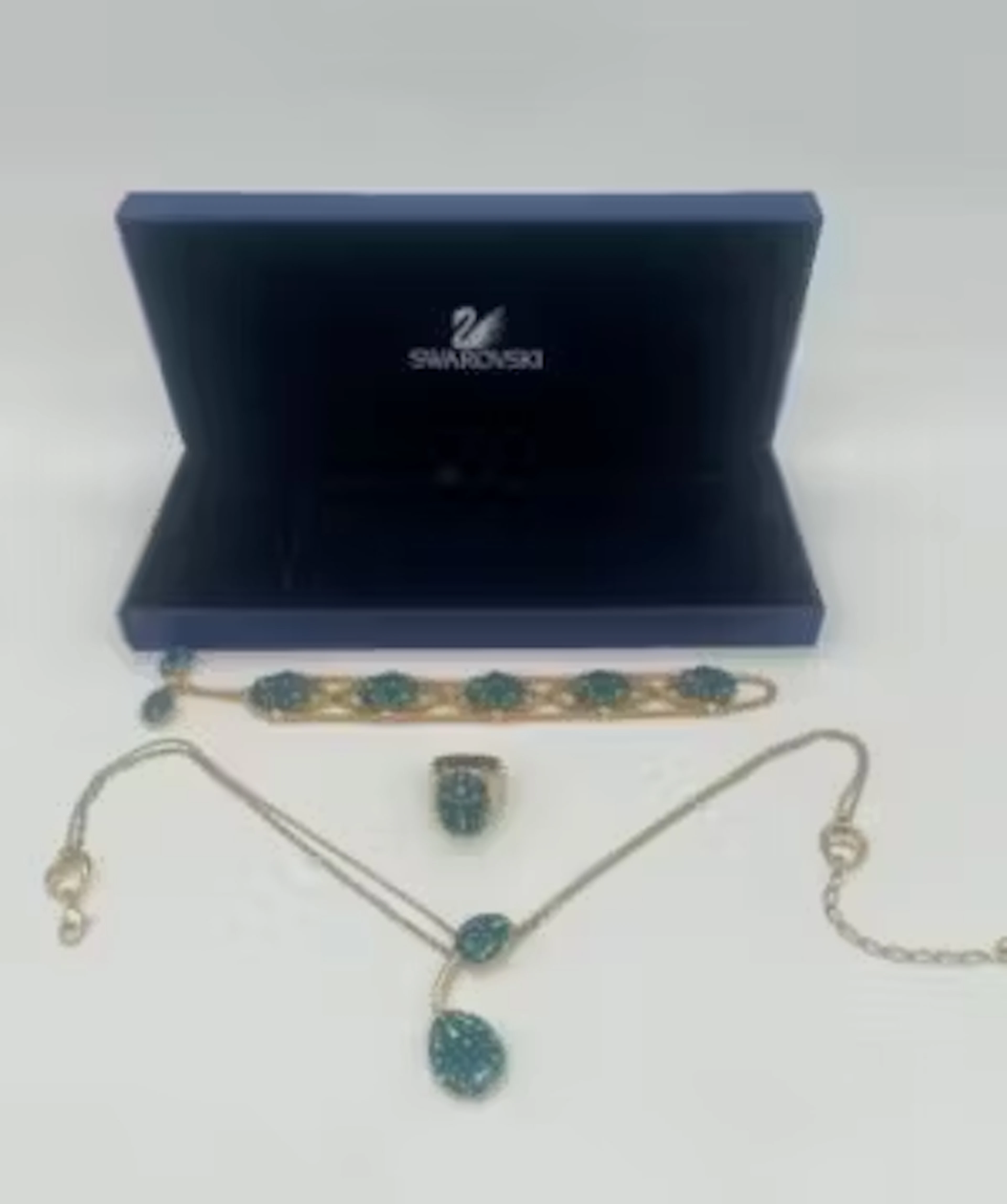 Swarovski suite of two blue and green crystal necklaces and a ring