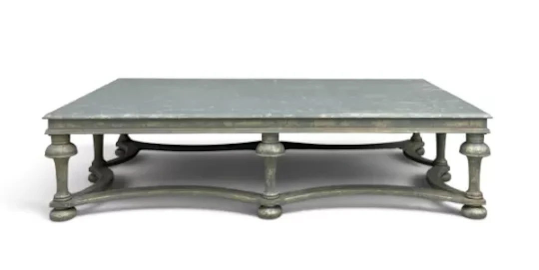 A contemporary distressed painted coffee table in the Jacobean style