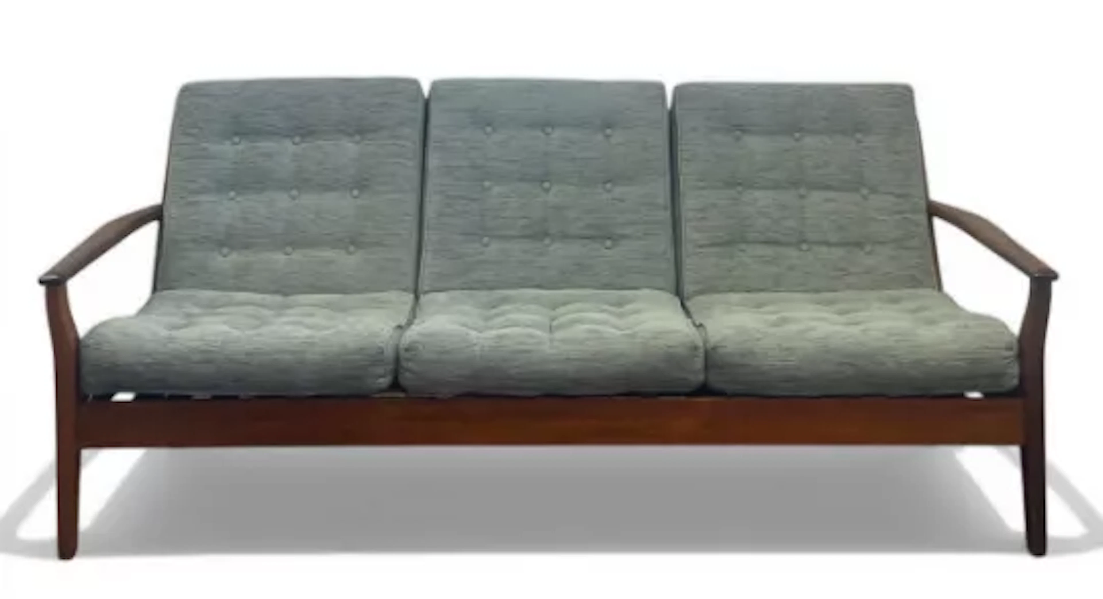 A mid-century Danish three seater sofa with removable sage green upholstered