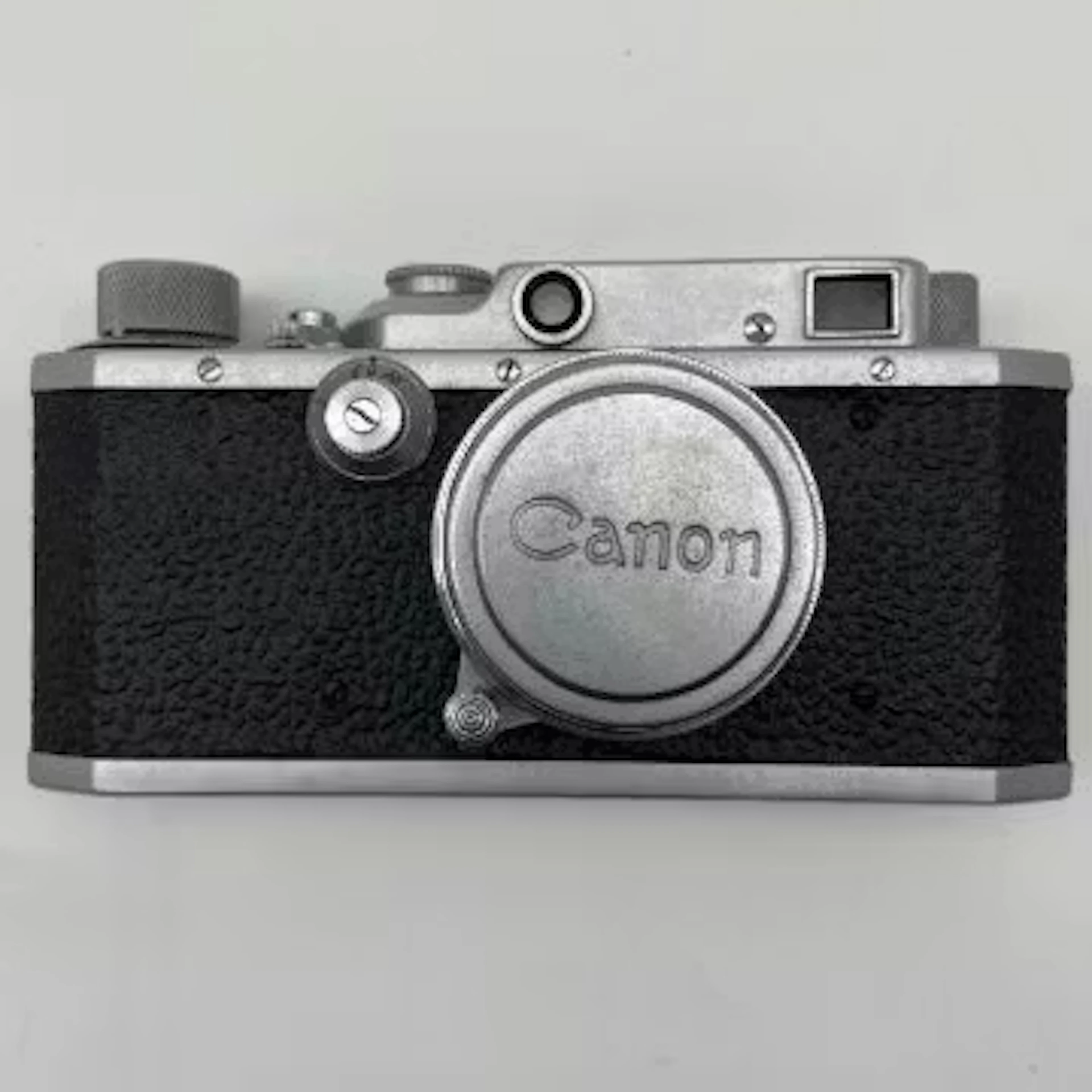 A 1950s vintage Japanese metal cased bottom-loading Canon Camera Co.