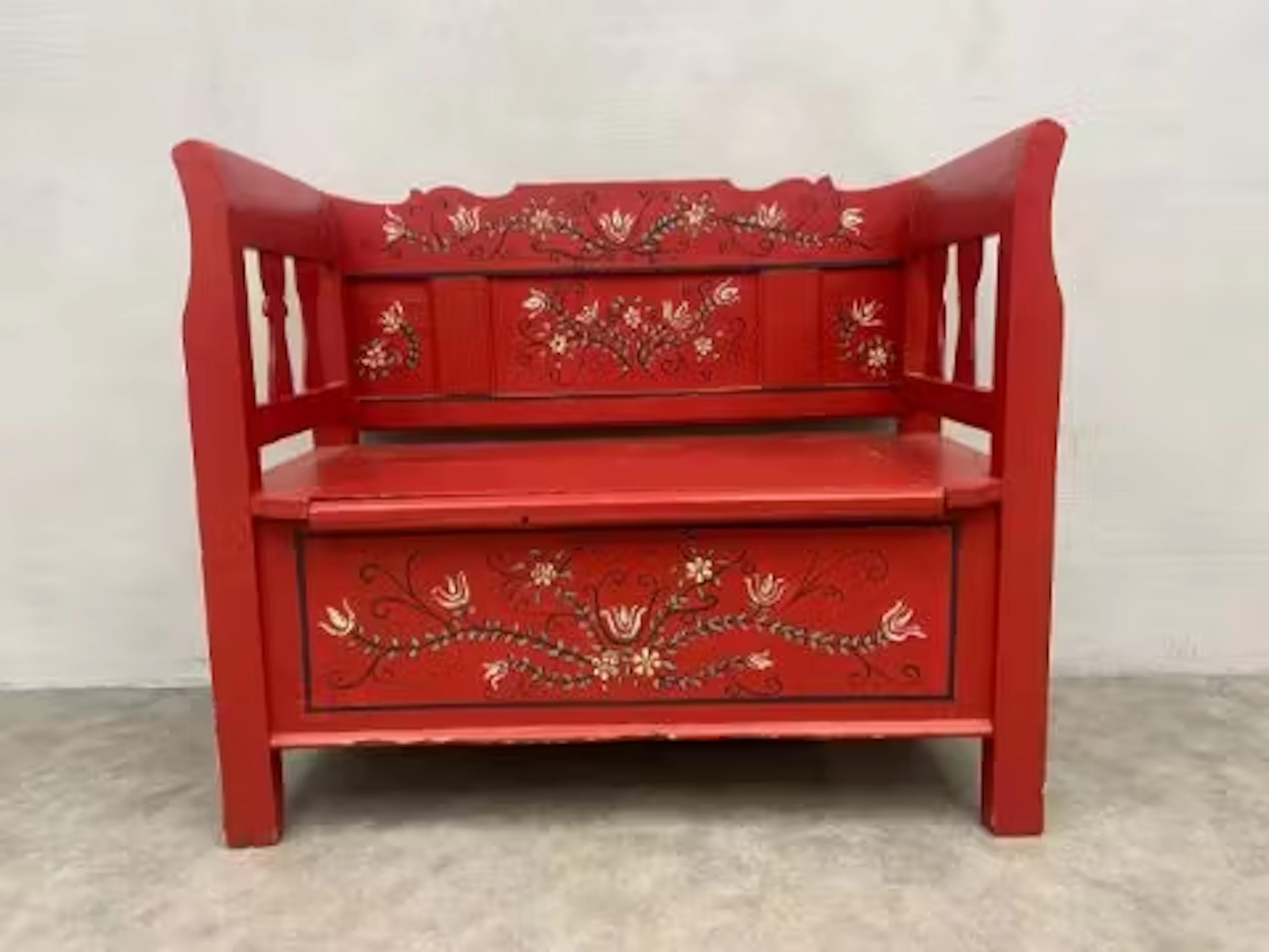 A 19th century Scandinavian painted pine bench with lift up seat and