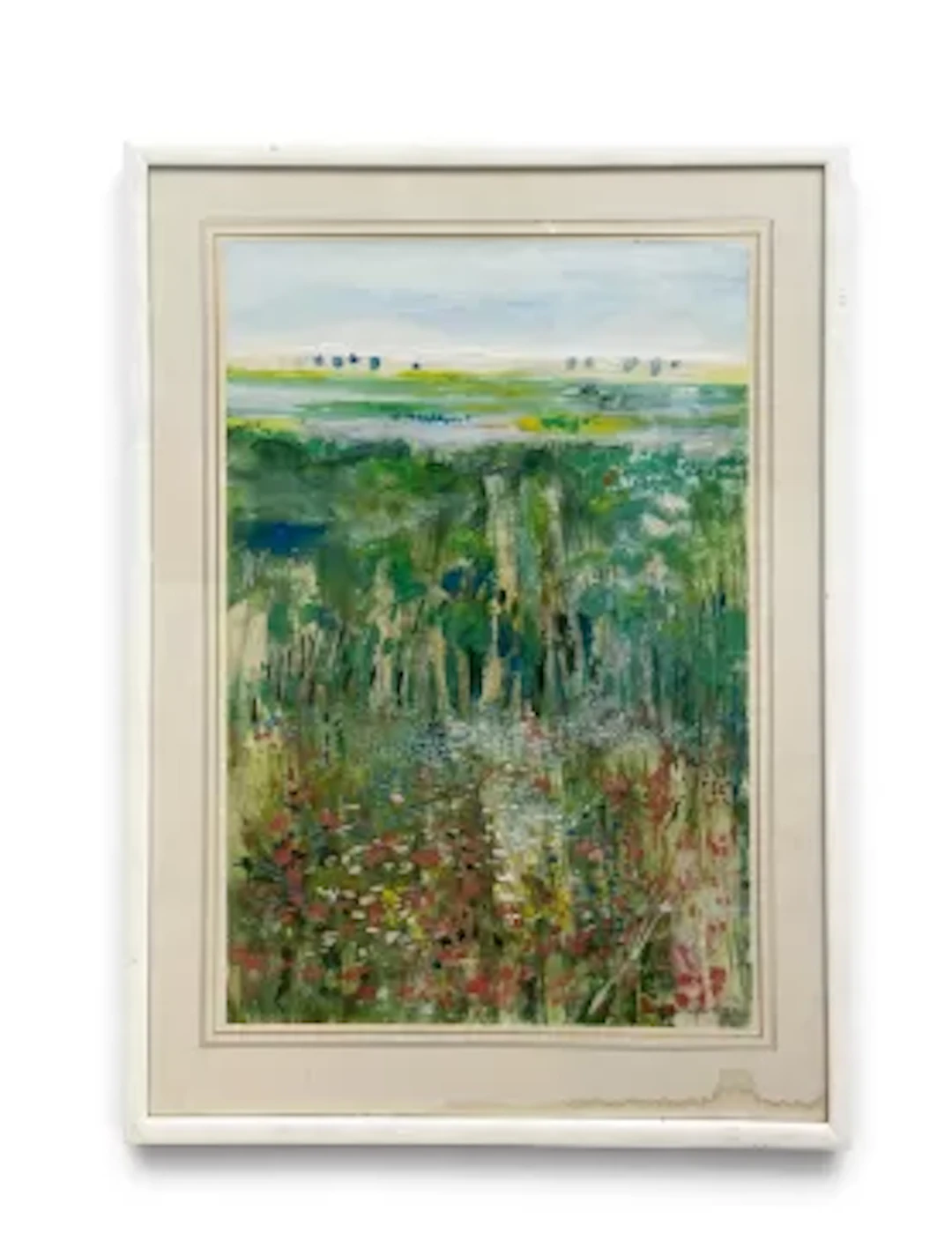 A framed and glazed watercolour, flowers in a meadow with distant