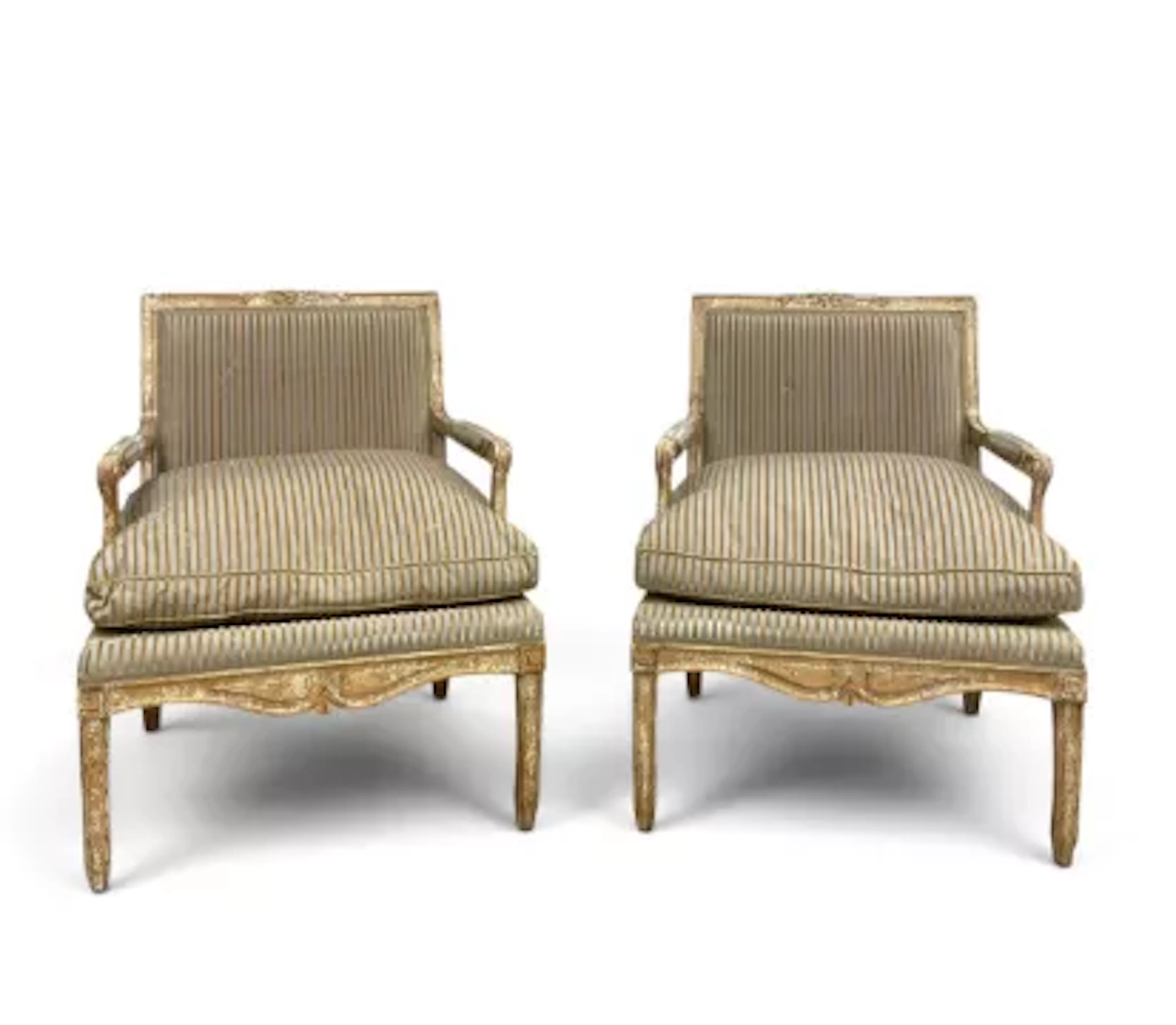 A pair of contemporary Empire style open armchairs with wide squab