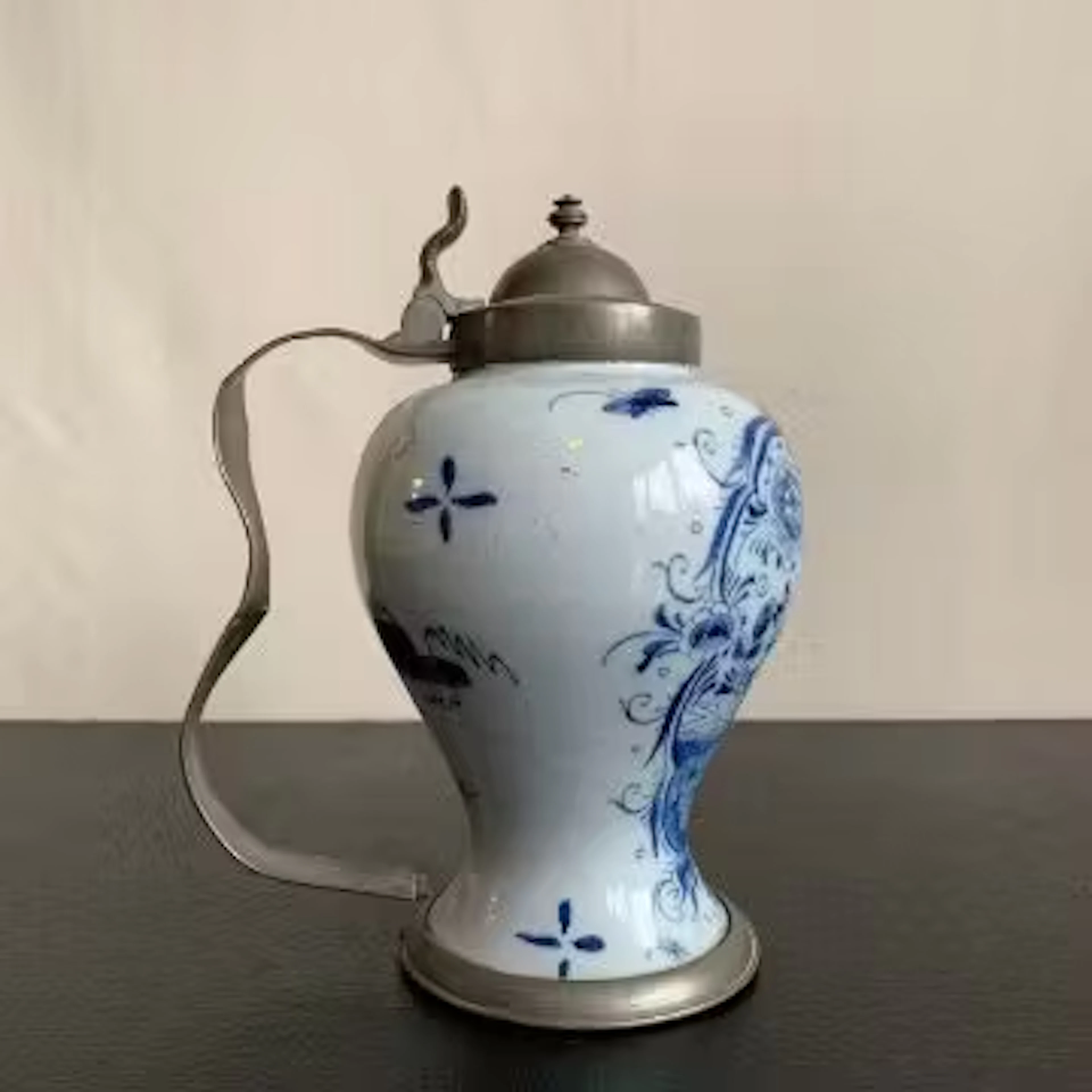 A possibly 18th century pewter mounted blue and white Dutch delftware