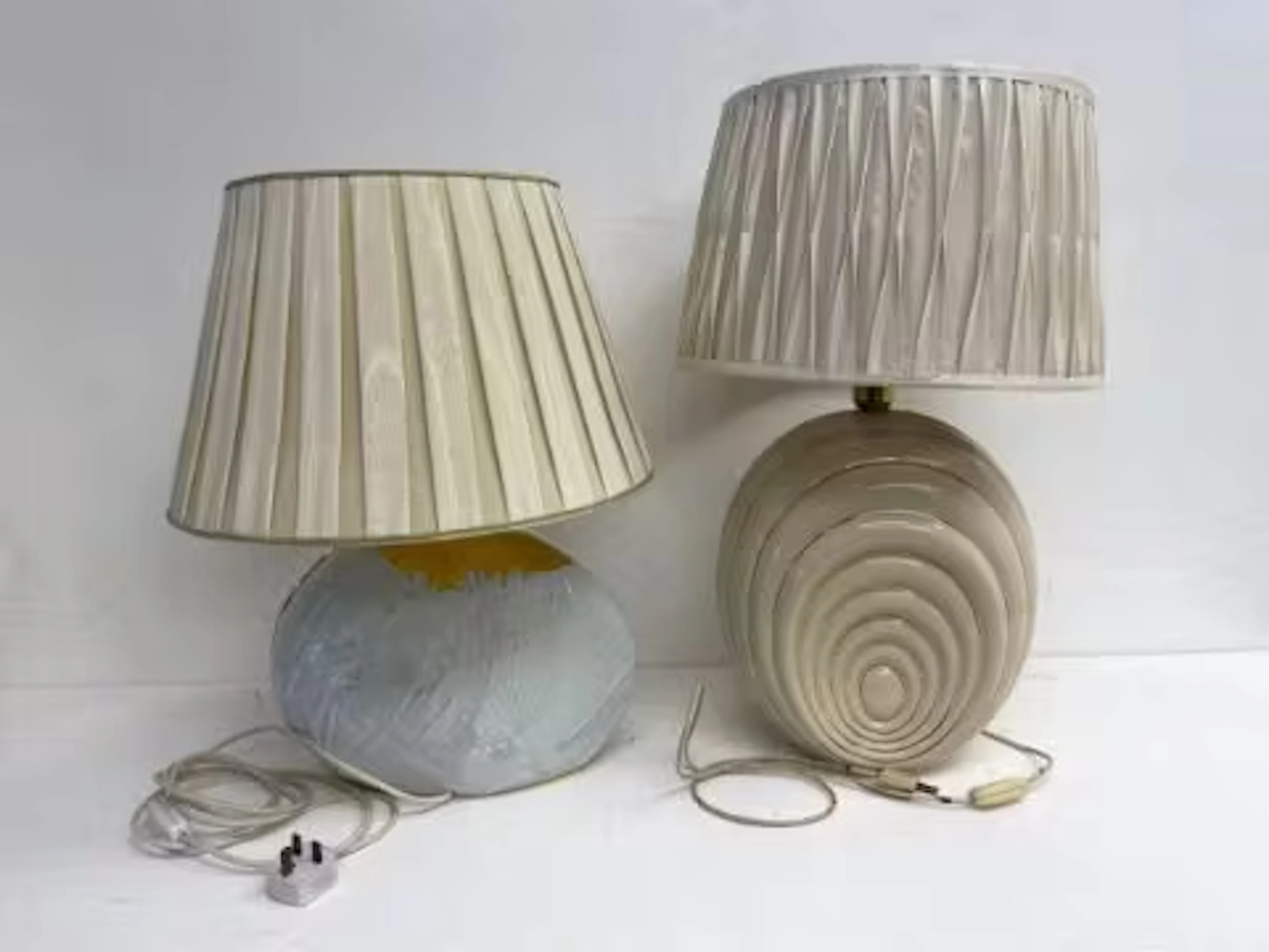 Two 1980's vintage porcelain table lamps with their shades, one marked
