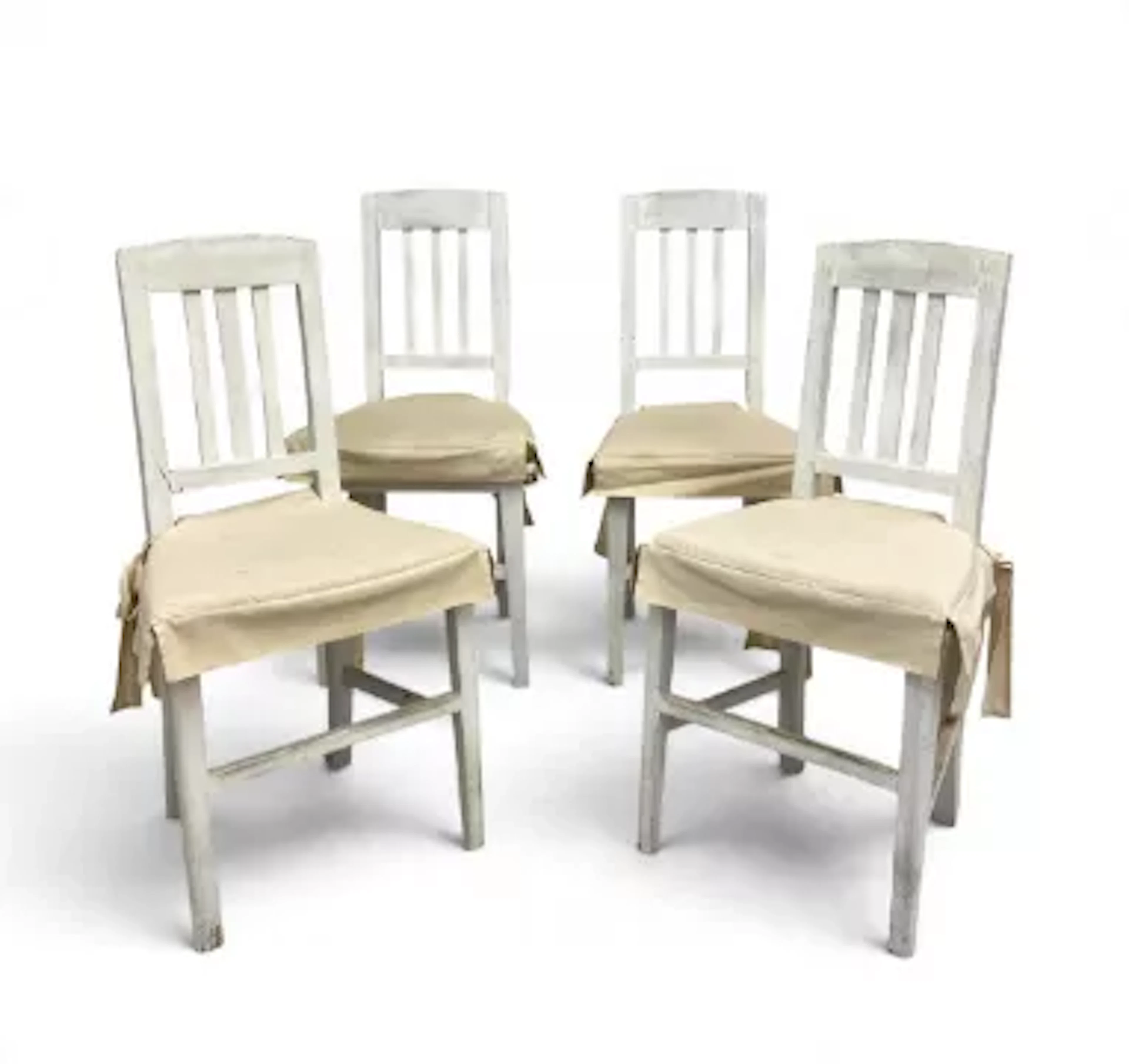 A set of four vintage Scandinavian painted dining chairs fitted with