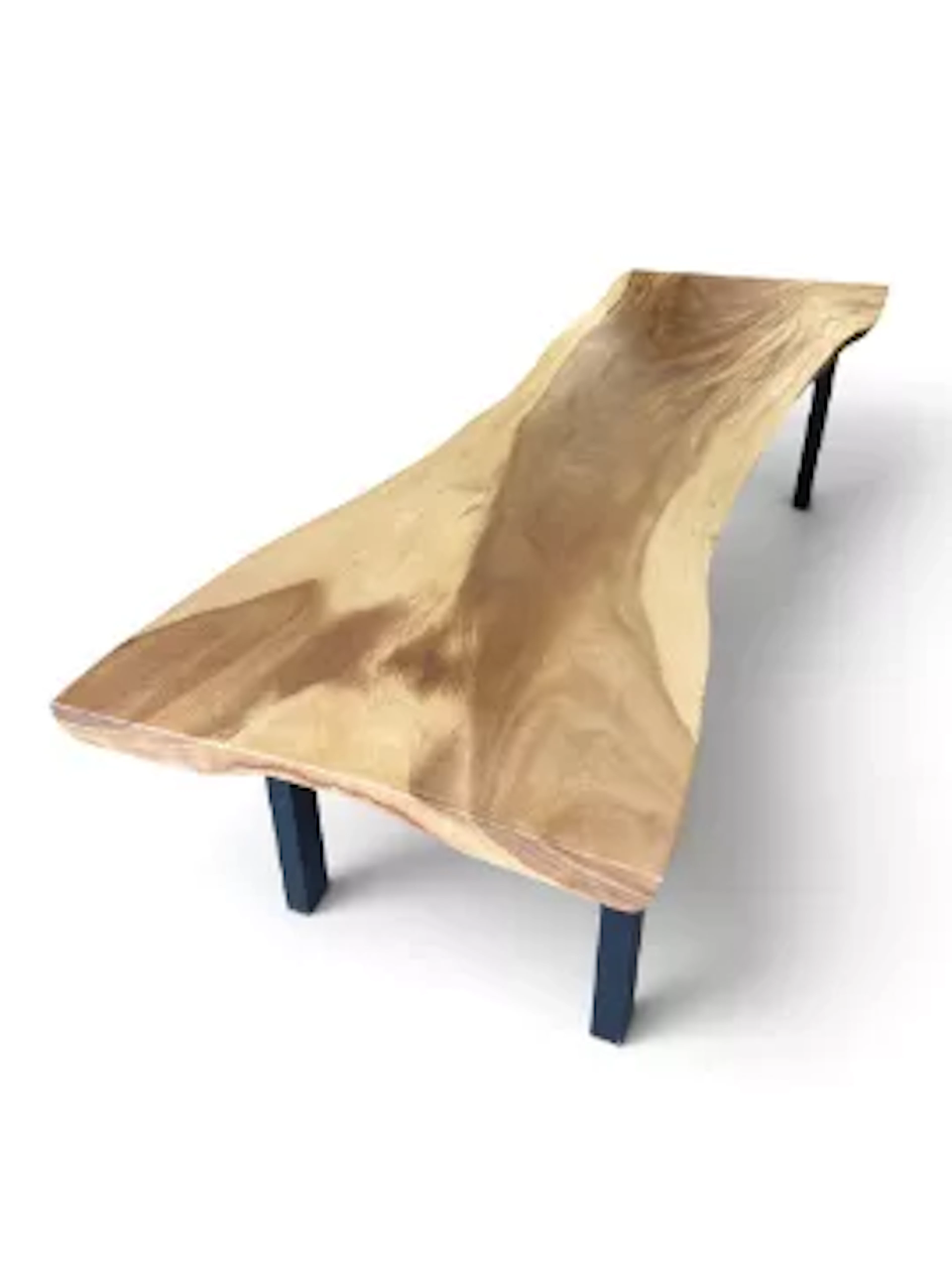 A contemporary dining table from a single cut of Indonesian suar on
