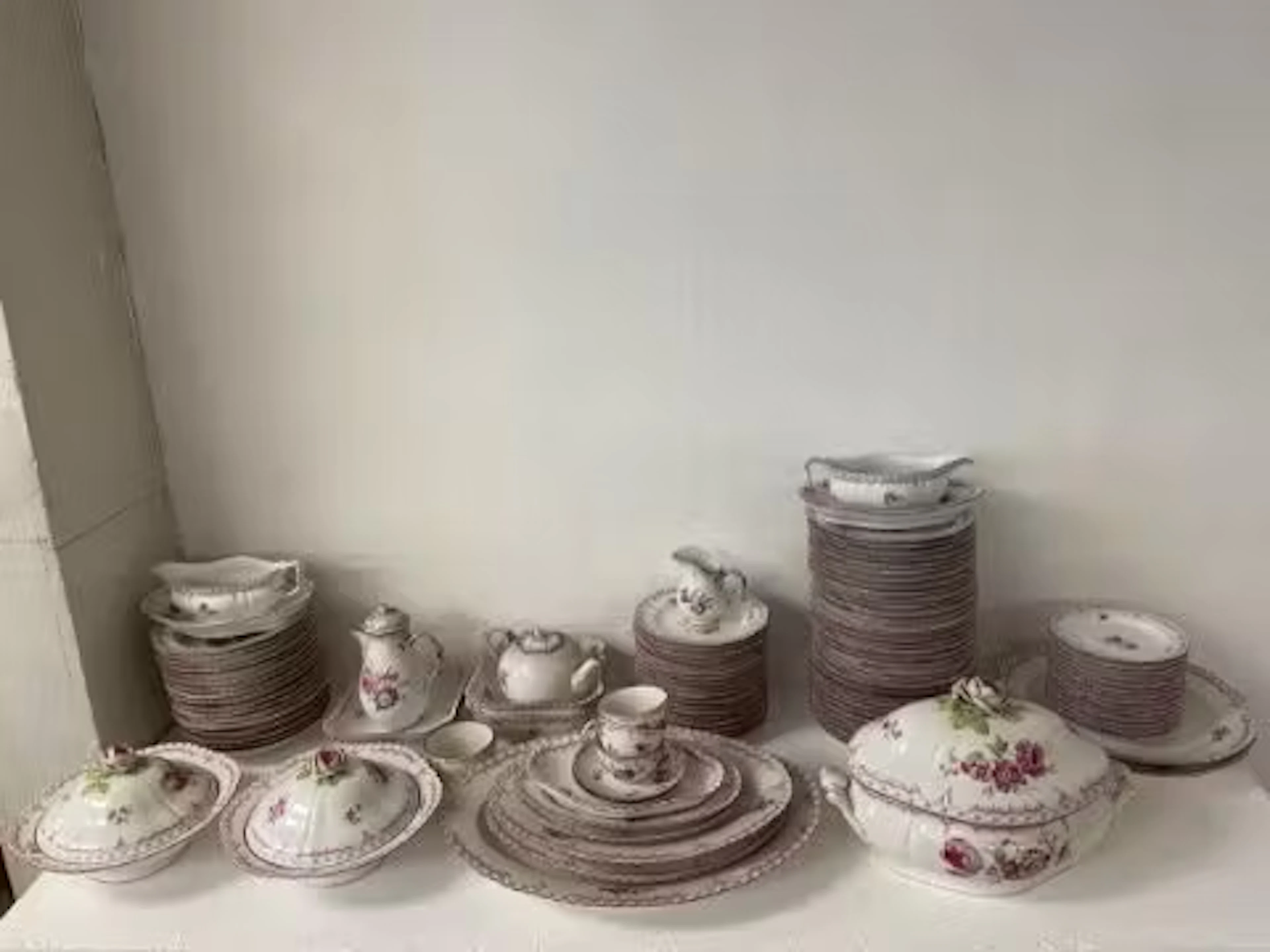 A large KPM Berlin porcelain dinner service to include three lidded