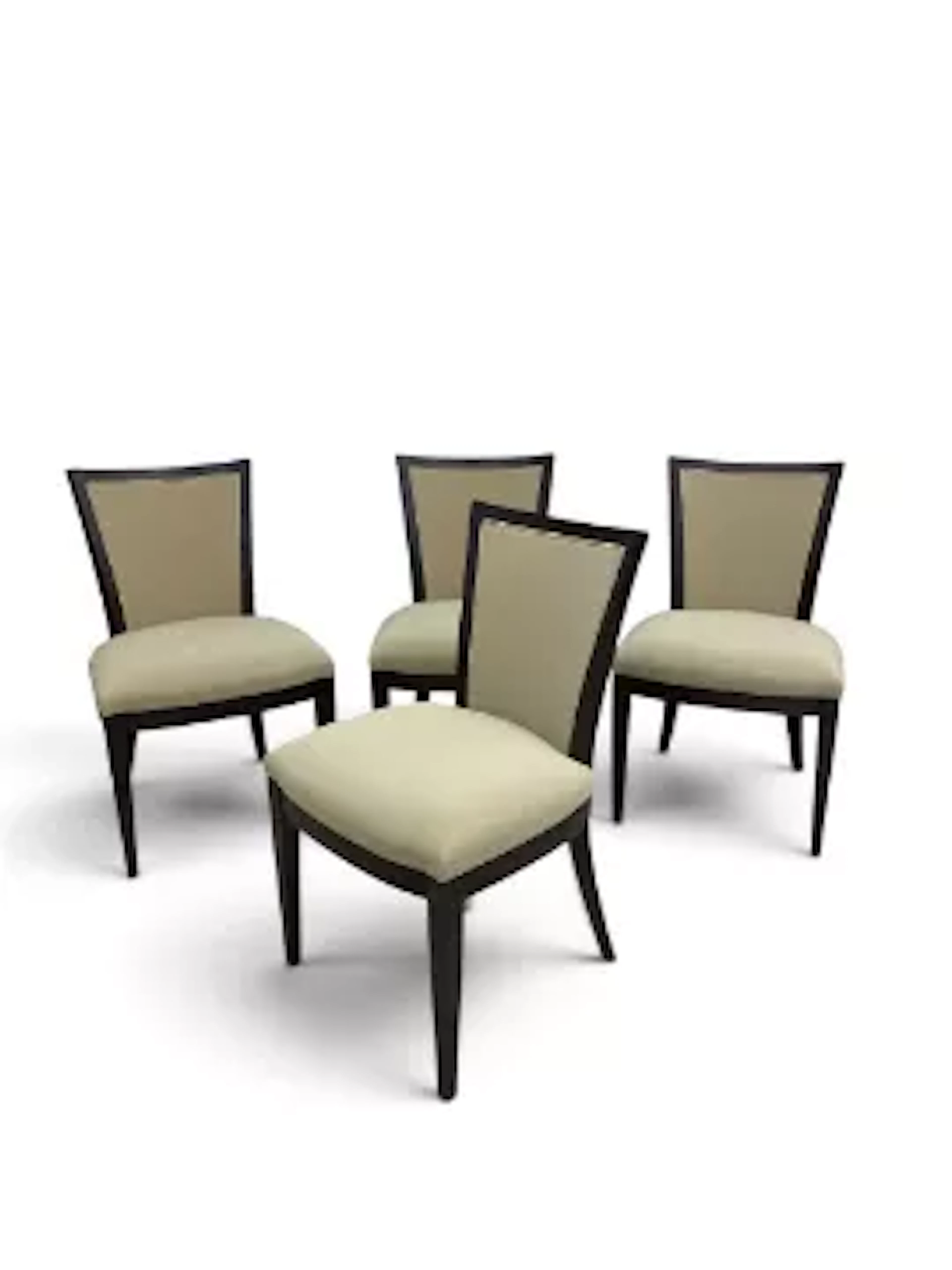 A set of four contemporary stained teak dining chairs in calico upholstery.