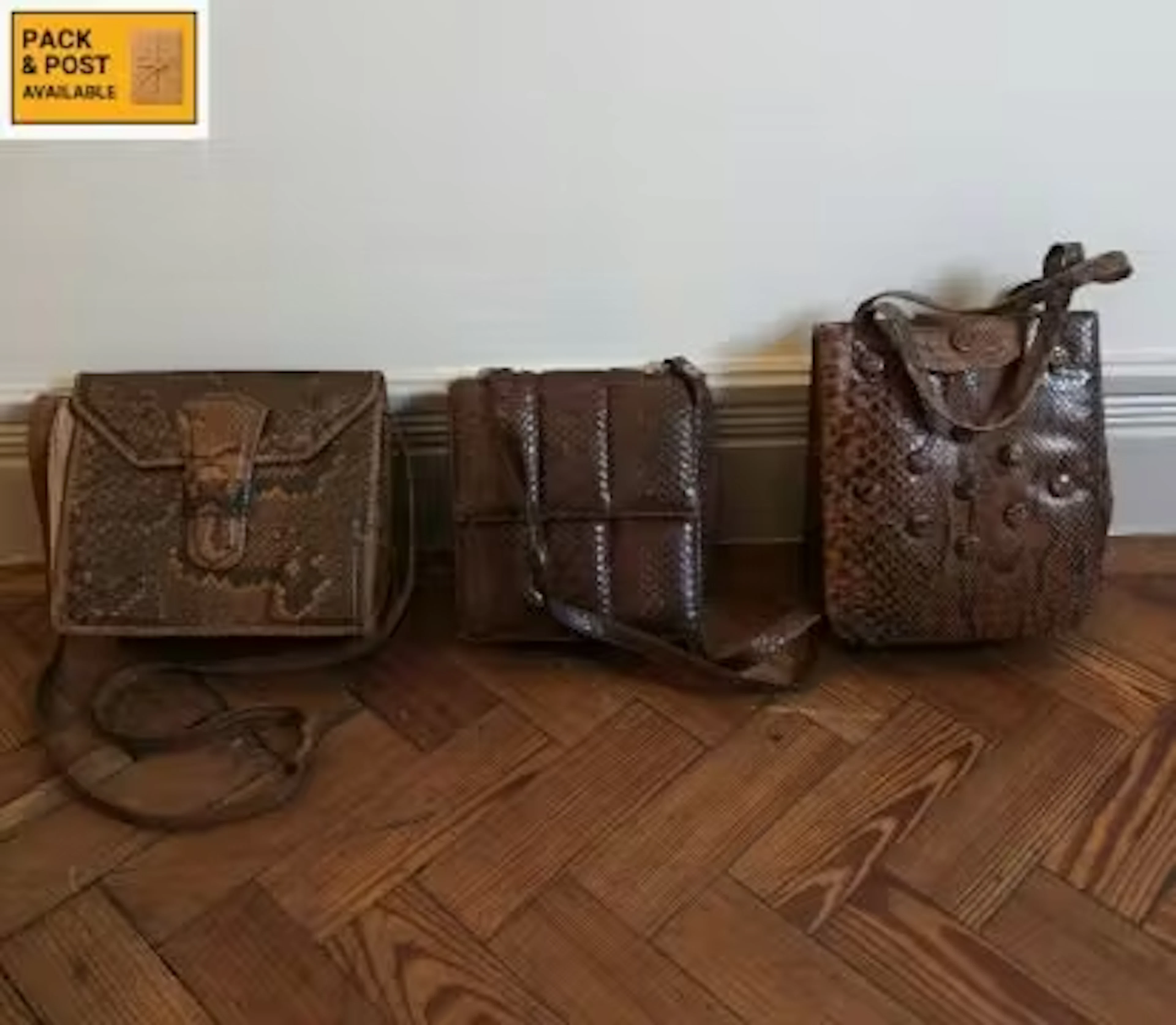 Three vintage snake and crocodile skin handbags. 25x23cm. (Largest).