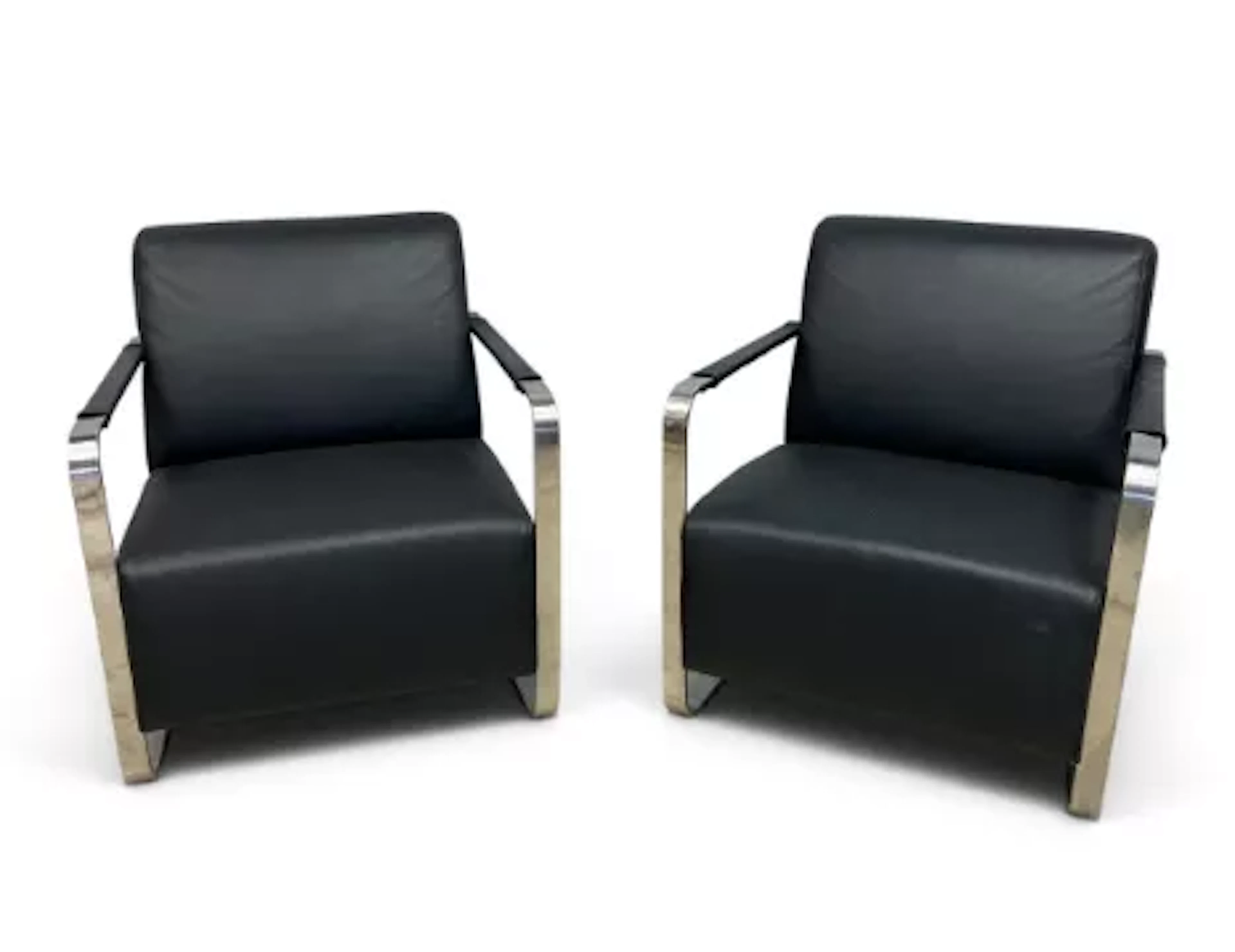 A pair of contemporary Bauhaus inspired armchairs in chrome and black