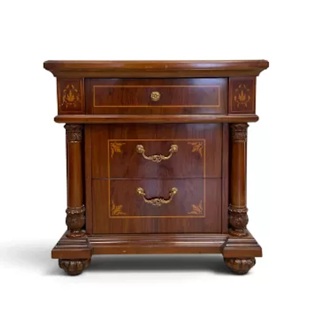 A small Continental style walnut and satinwood inlaid chest of three