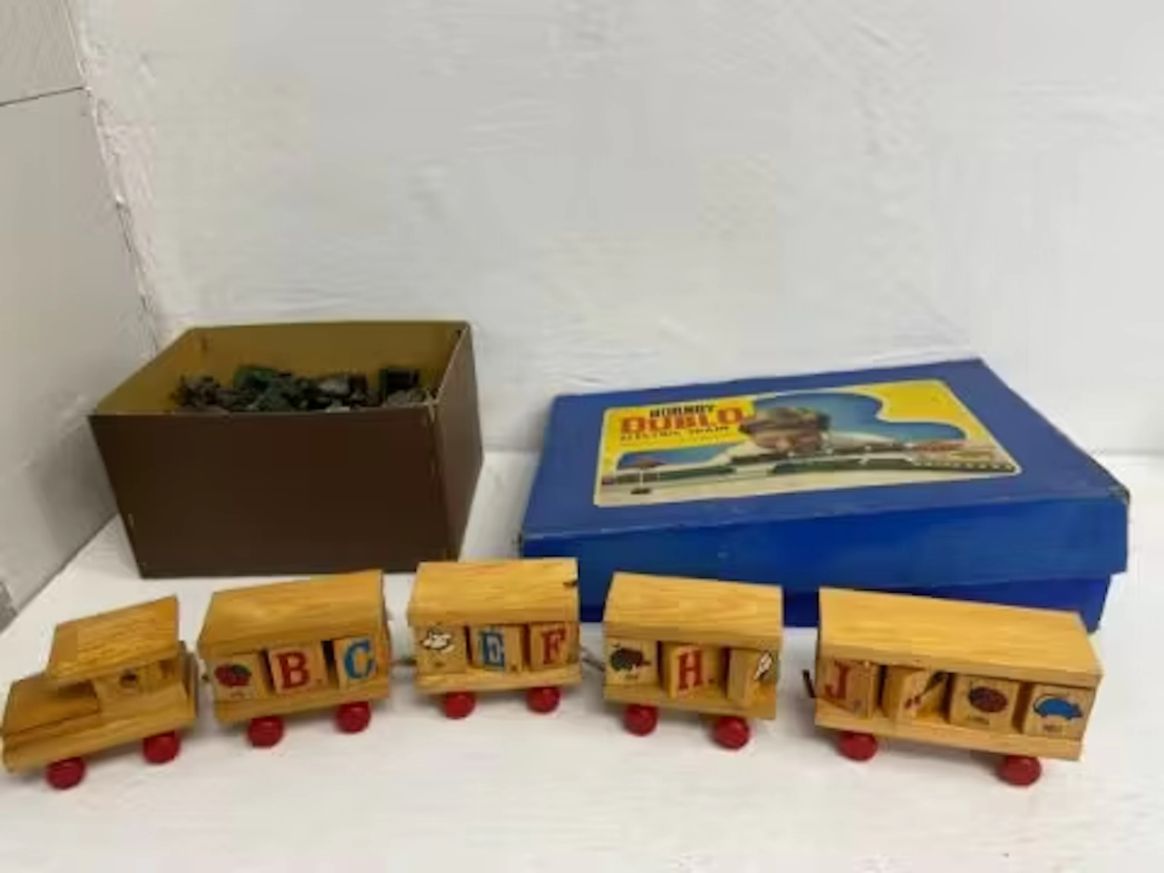 A boxed Hornby Dublo train set, a box of micellaneous lead toy soldiers