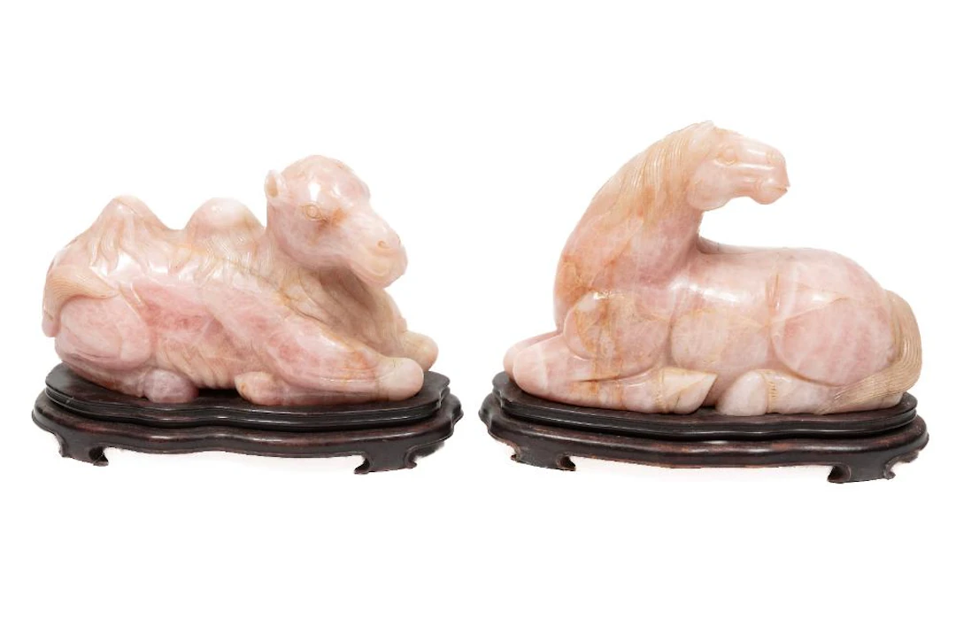 Two Large Chinese Carved Rose Quartz Recumbent Figures