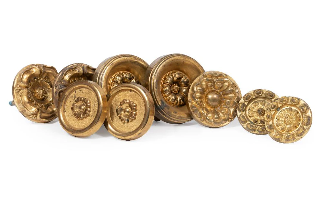 Group of Antique American Gilt Brass Tiebacks (8 pcs.)