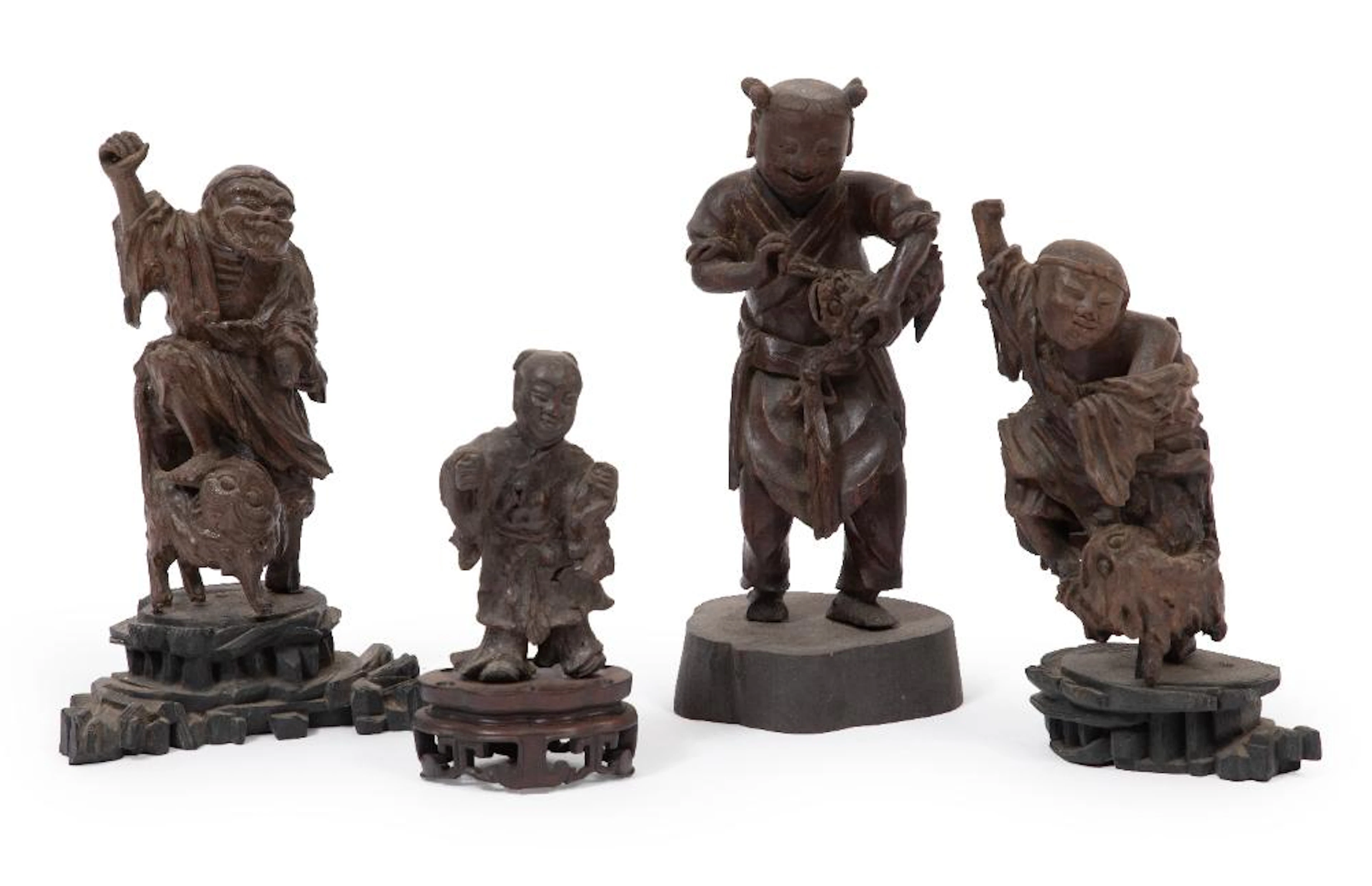 Four Chinese Carved Wood Daoist and Folk Figures on Stands