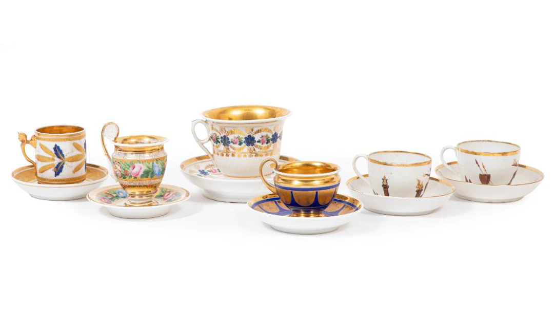 Six Paris Porcelain Gilt and Polychrome Cups and Saucers