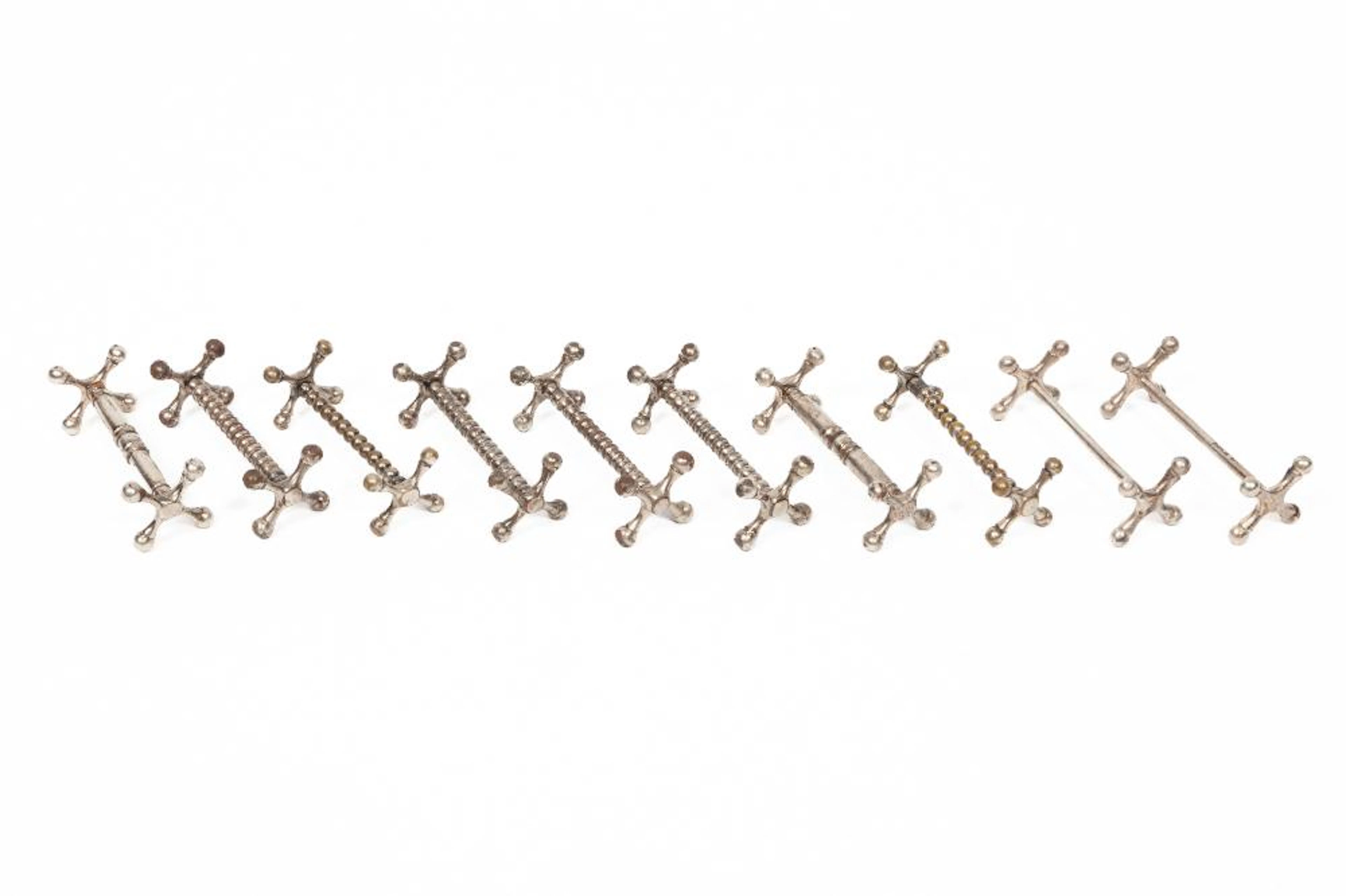 Associated Group of Ten Silver and Silverplate Knife Rests