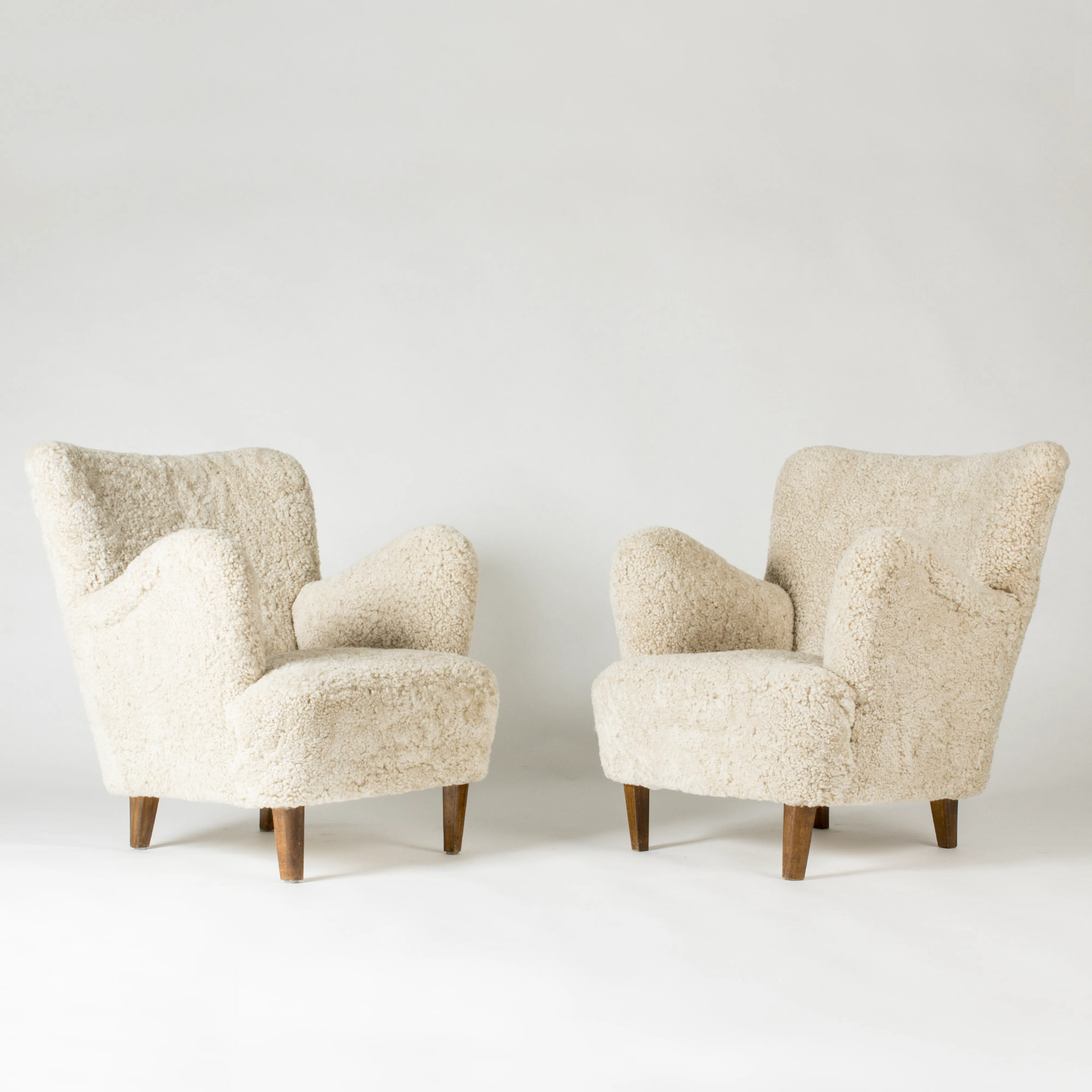 Swedish Modern sheepskin lounge chairs