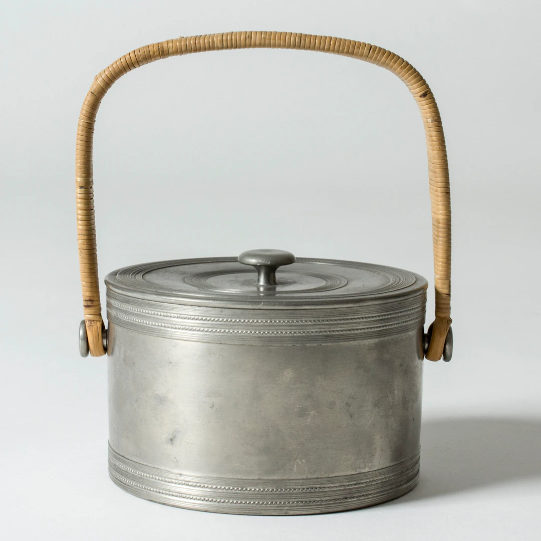 Pewter and rattan jar by Estrid Ericson