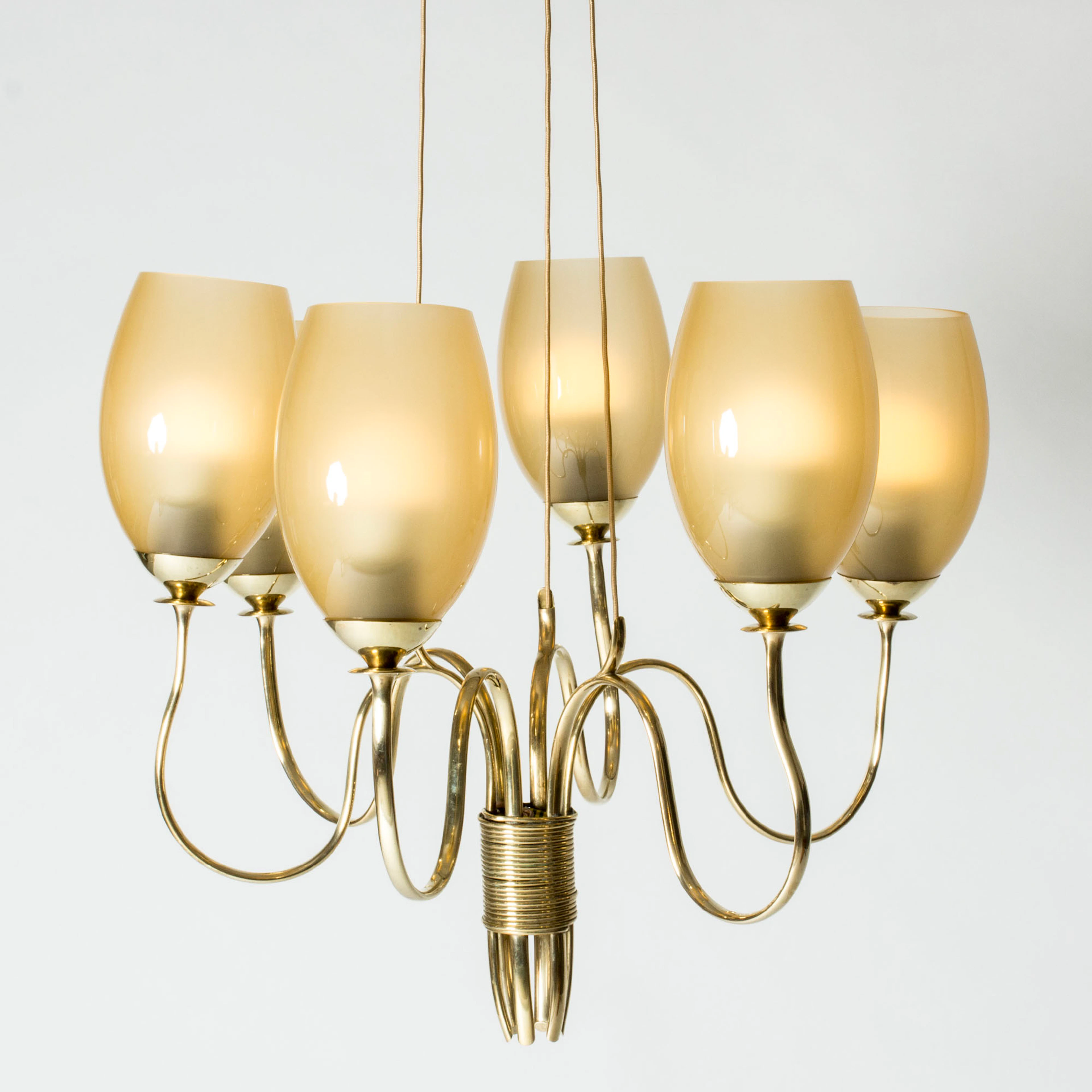 Brass chandelier by Paavo Tynell