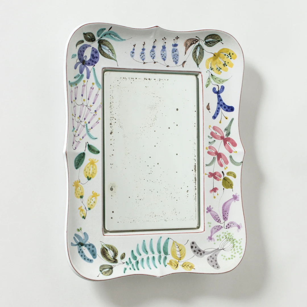Faience wall mirror by Stig Lindberg