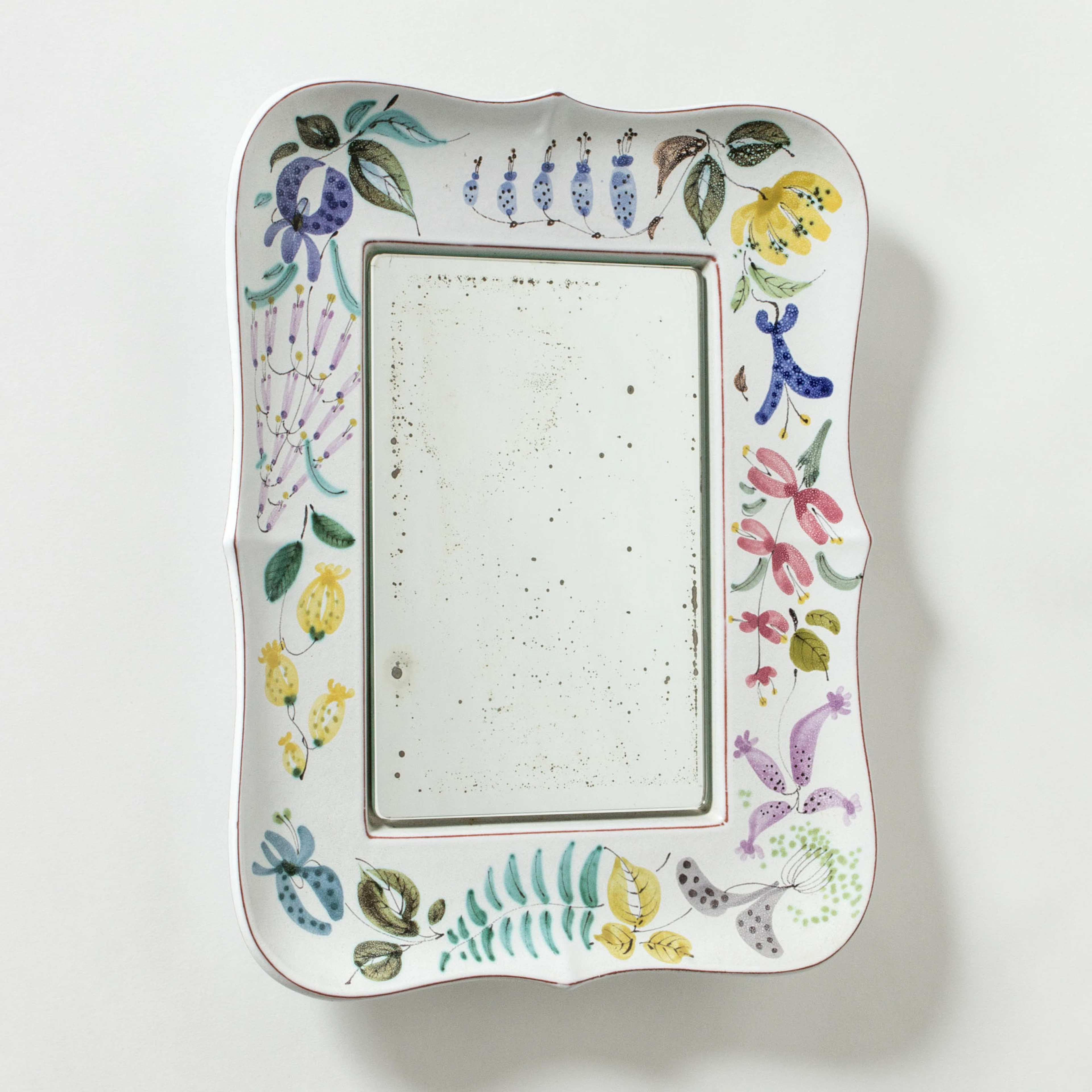 Faience wall mirror by Stig Lindberg