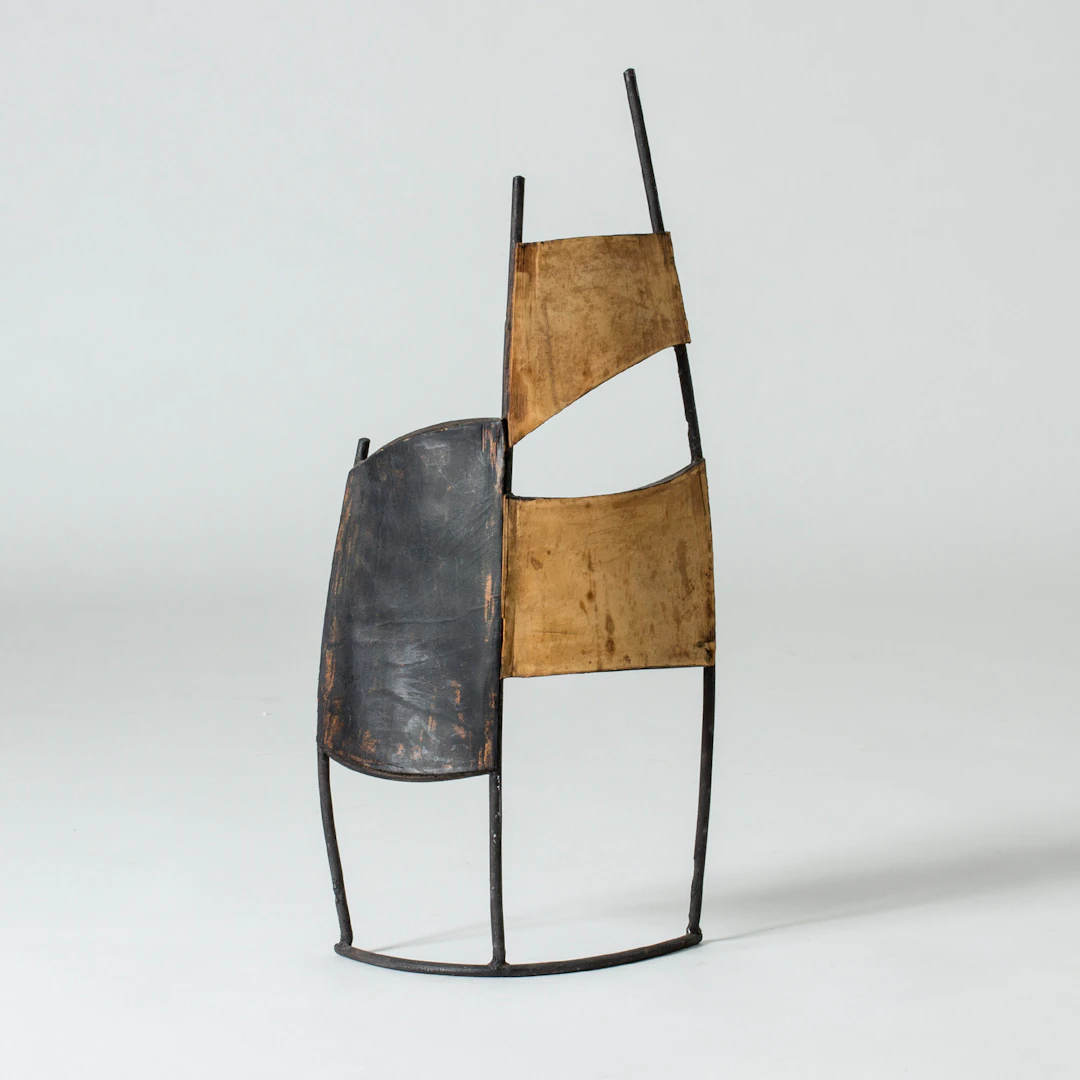 Leather and metal sculpture by Fred Leyman
