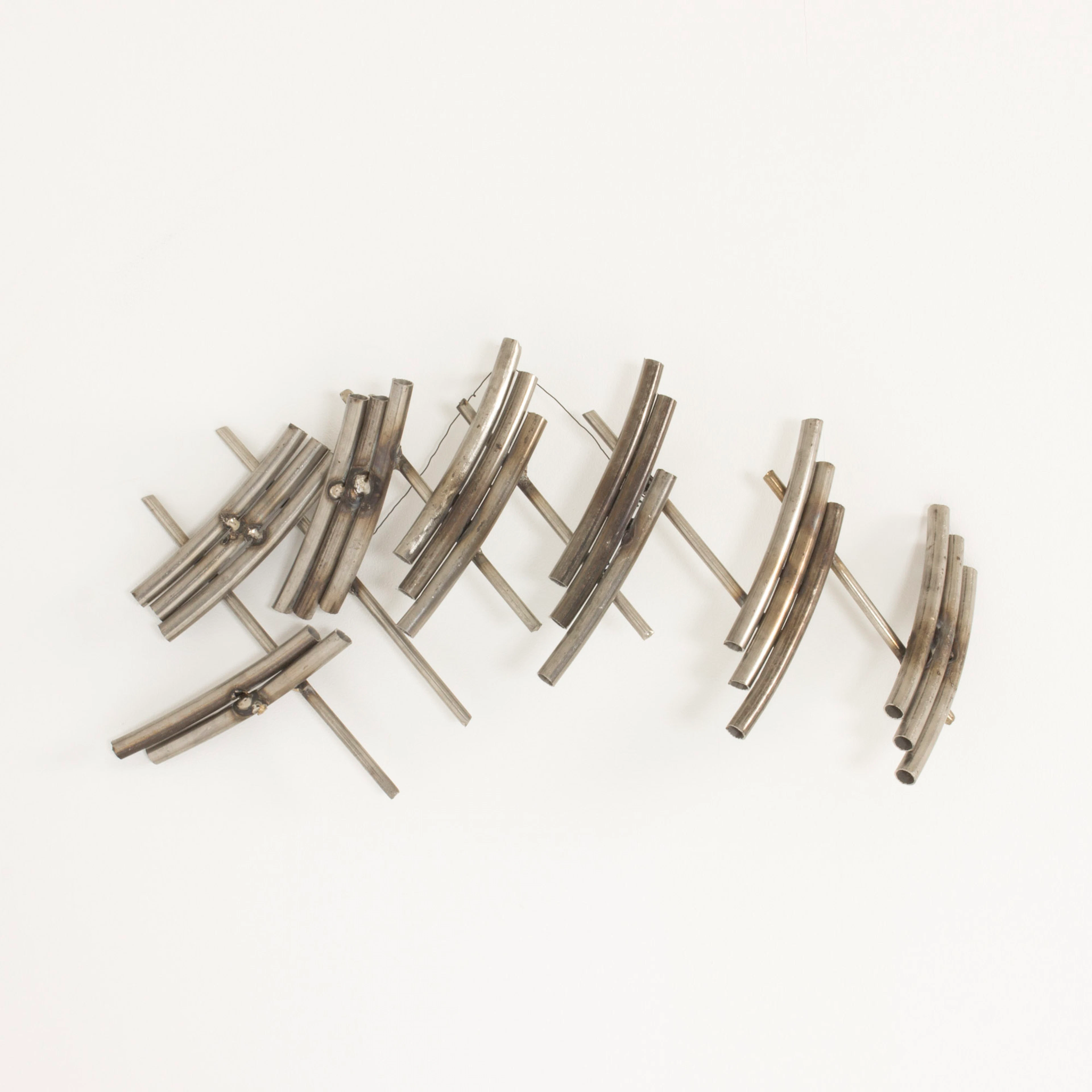 Steel wall sculpture by Fred Leyman
