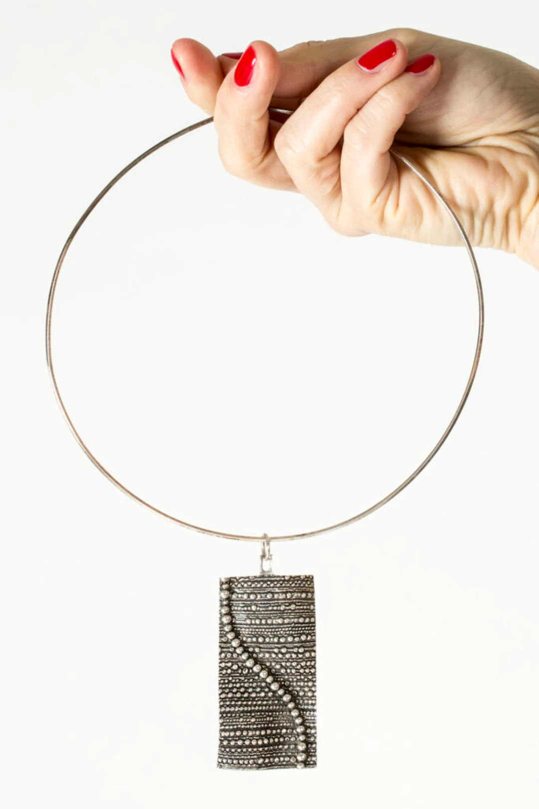Modernist silver neckring by Jorma Laine