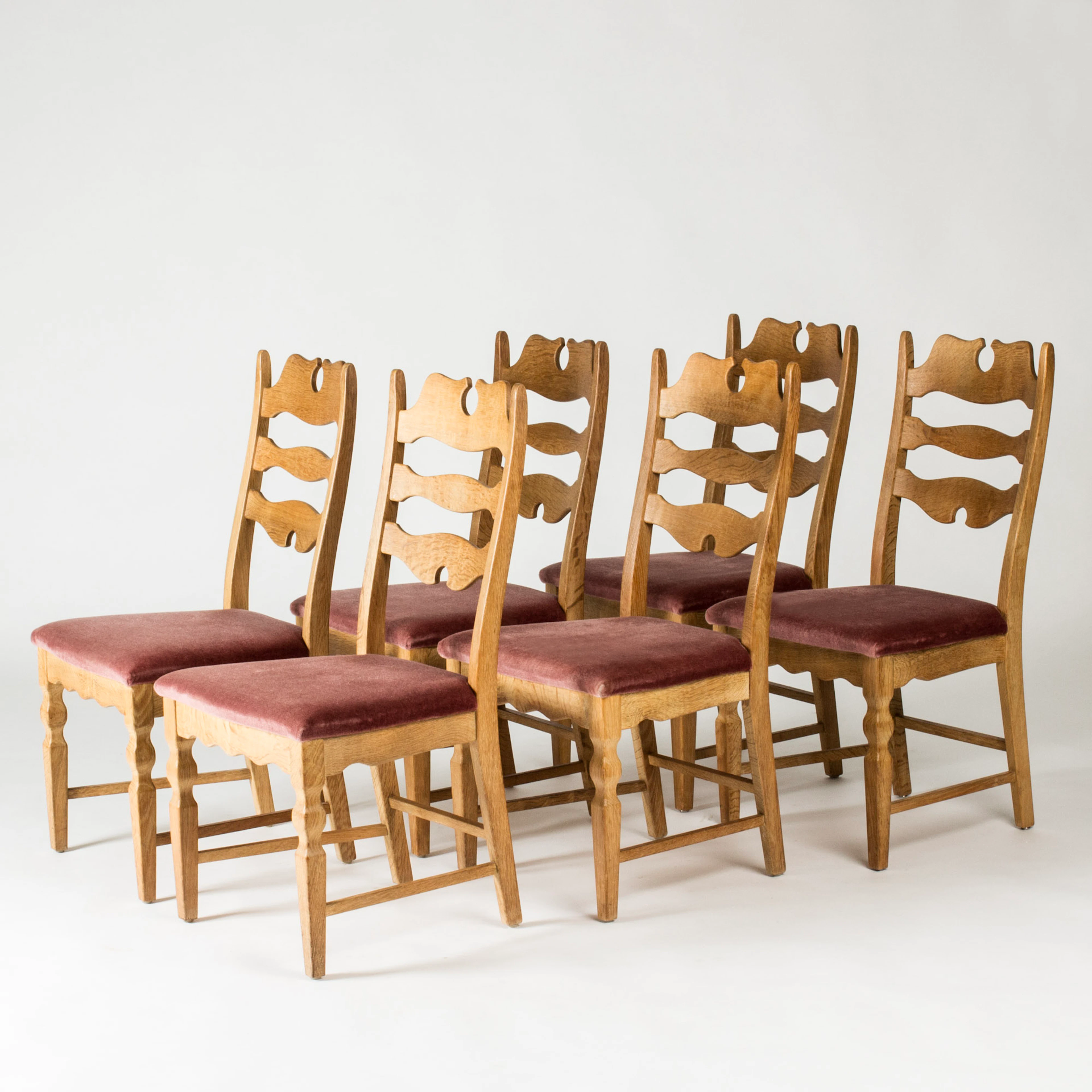Modernist “Razorblade” dining chairs by Henning Kjærnulf