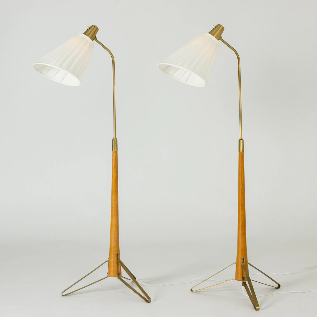 Brass and beech floor lamps by Hans Bergström