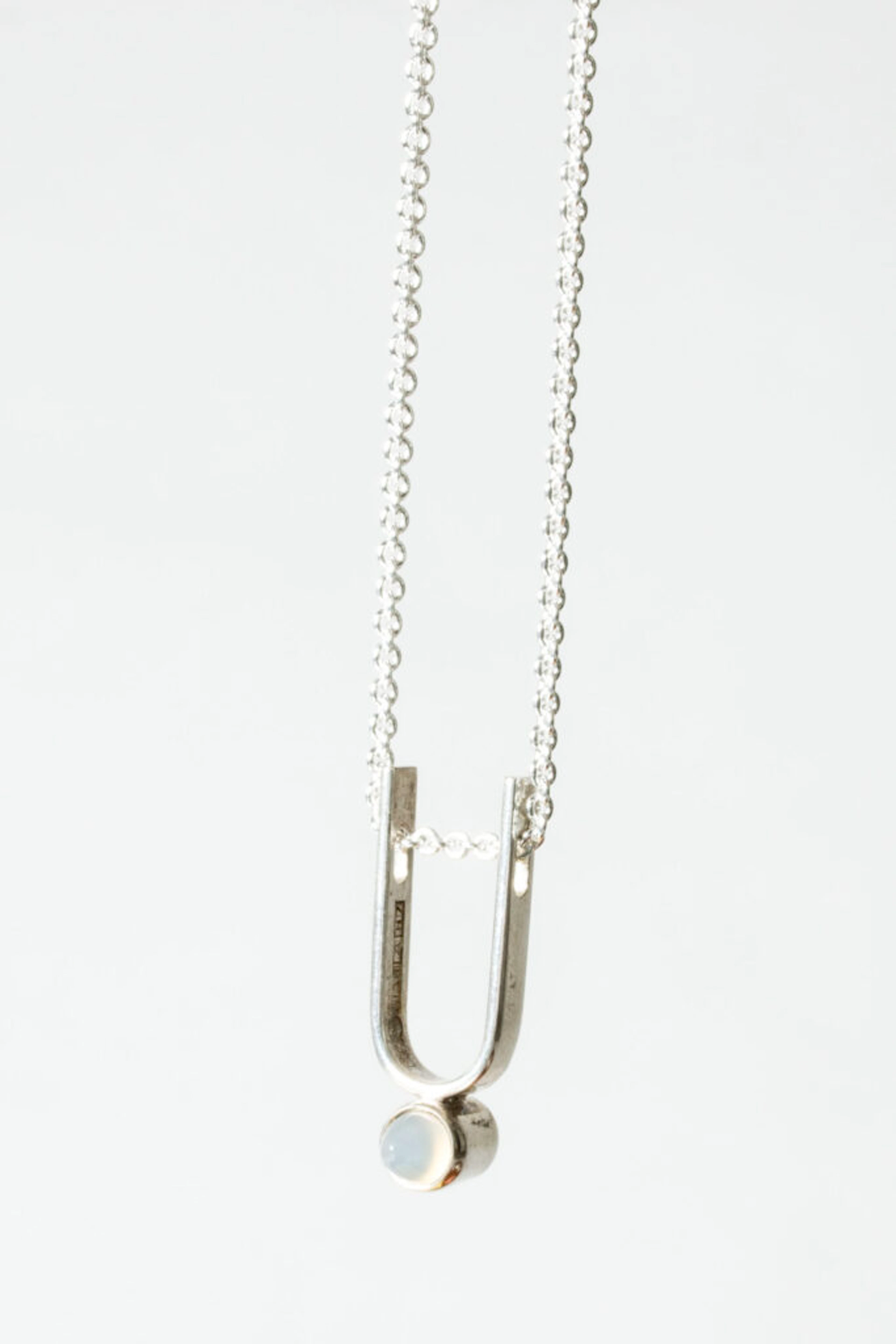 Modernist silver pendant by Elis Kauppi