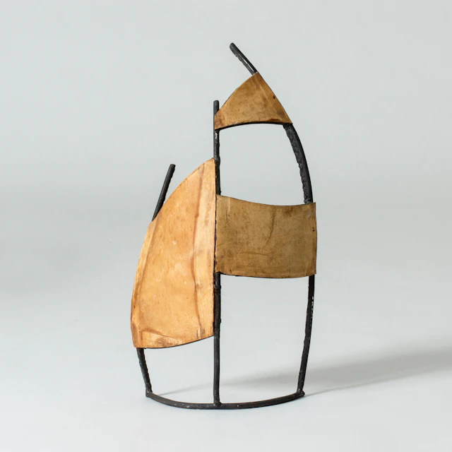 Leather and metal sculpture by Fred Leyman