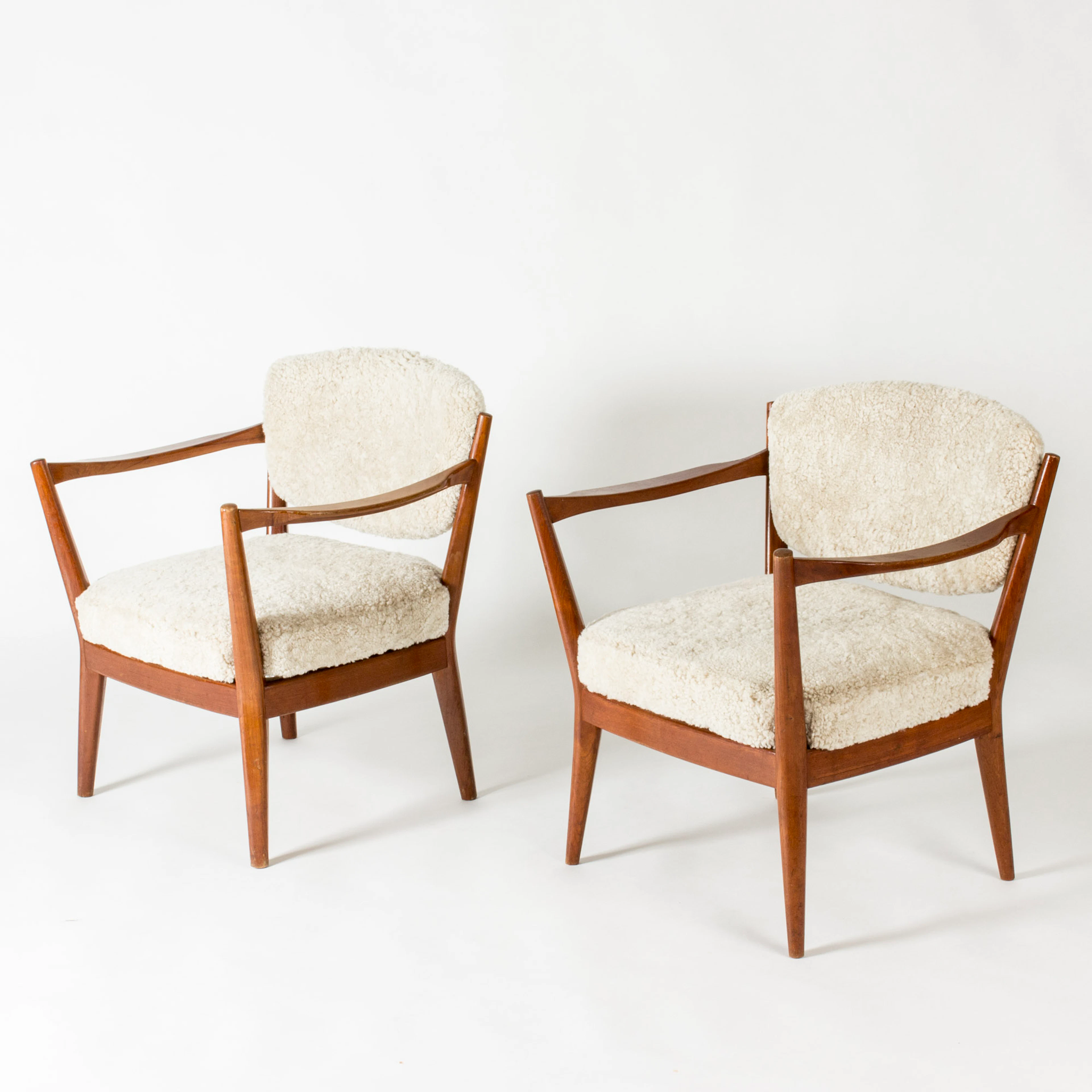Midcentury sheepskin lounge chairs by Fredrik Kayser
