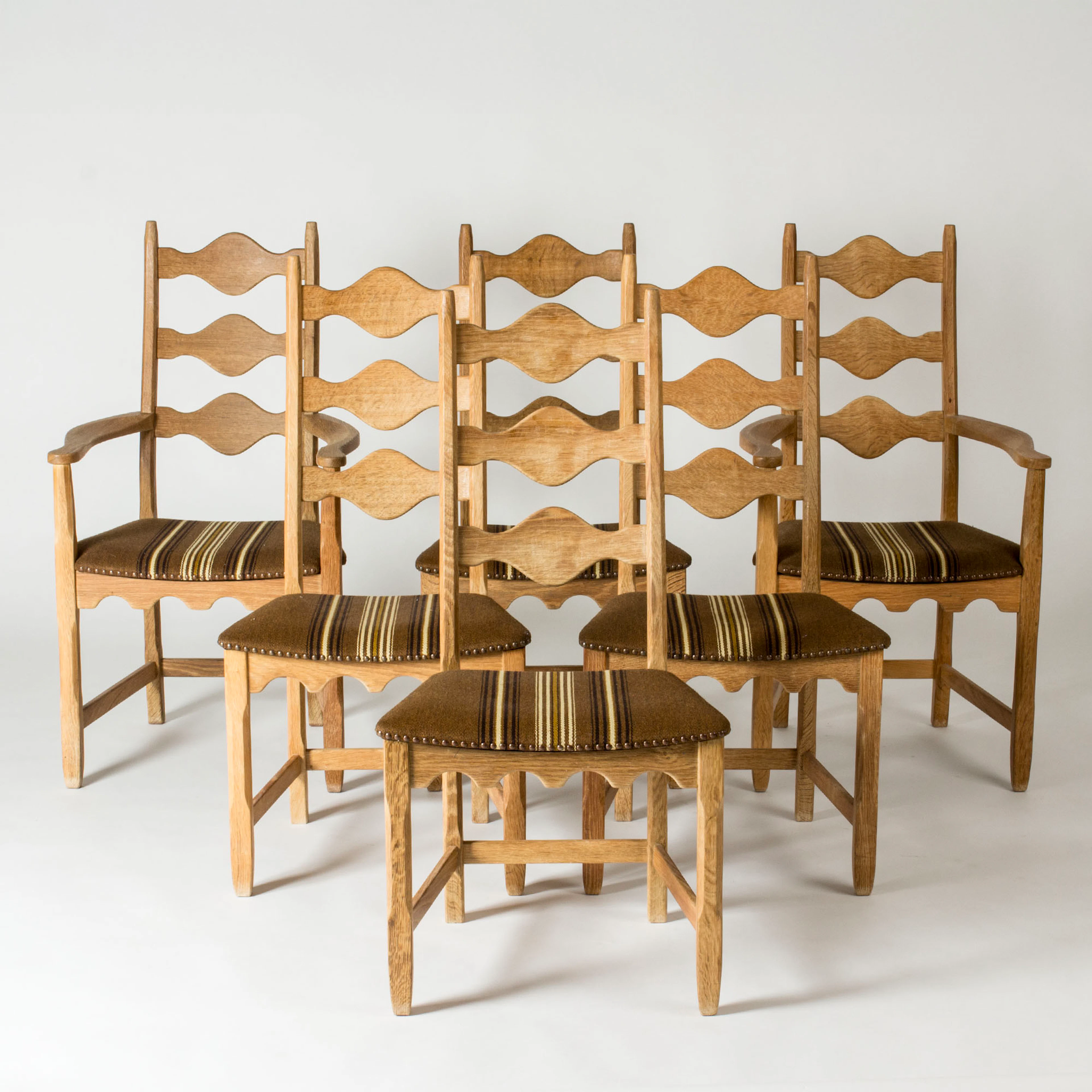 Midcentury dining chairs by Henning Kjærnulf